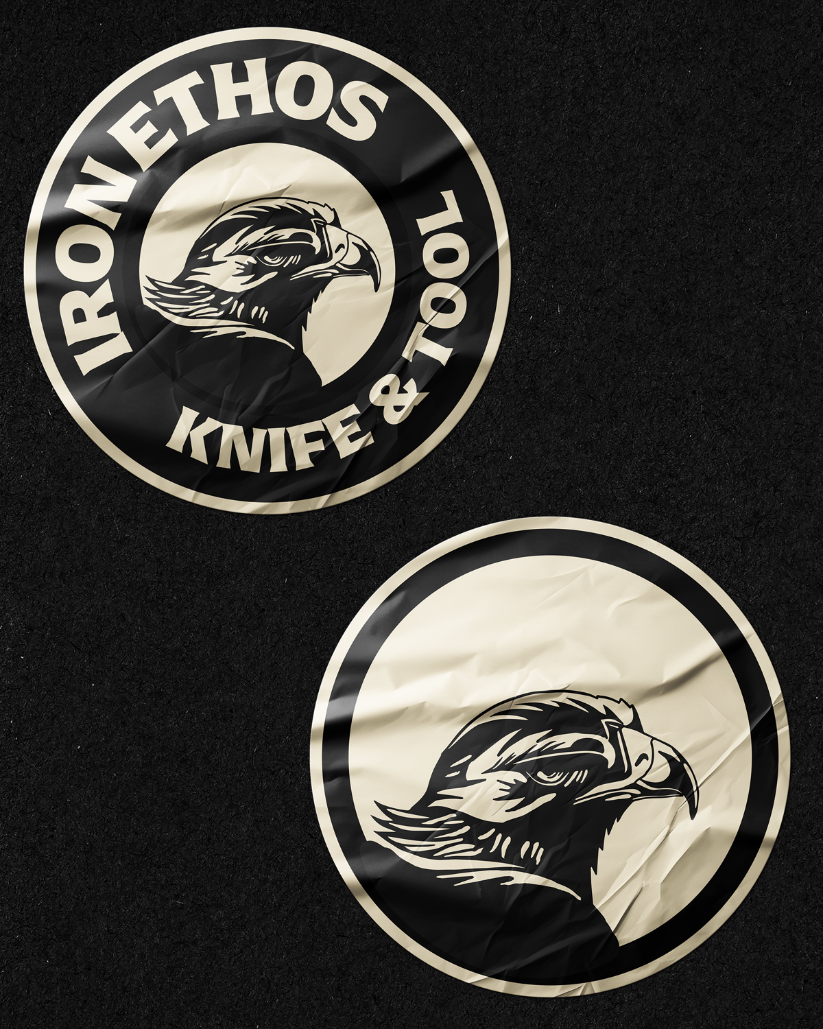 Two circular stickers on a black surface featuring a stylized eagle head and the text "Ironmethods Knife & Tool".
