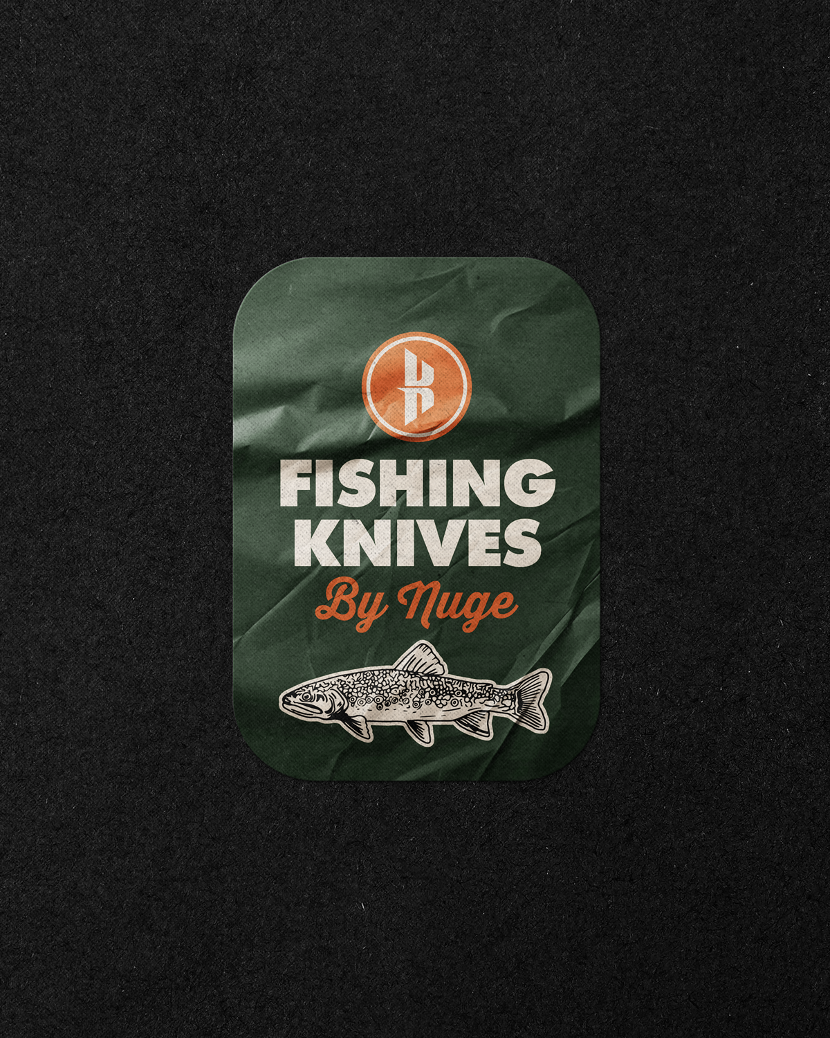Product package for fishing knives by Nuge, featuring a green background, a logo with a stylized 'B', and an illustration of a fish.