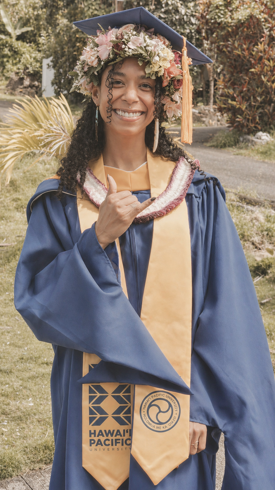Family Nurse Practitioner Celeste Brown smiling in graduation attire.