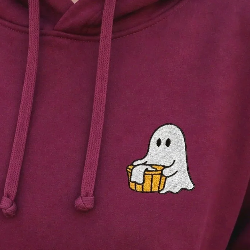 Burgundy hoodie with a small embroidered ghost holding a laundry basket on the chest.