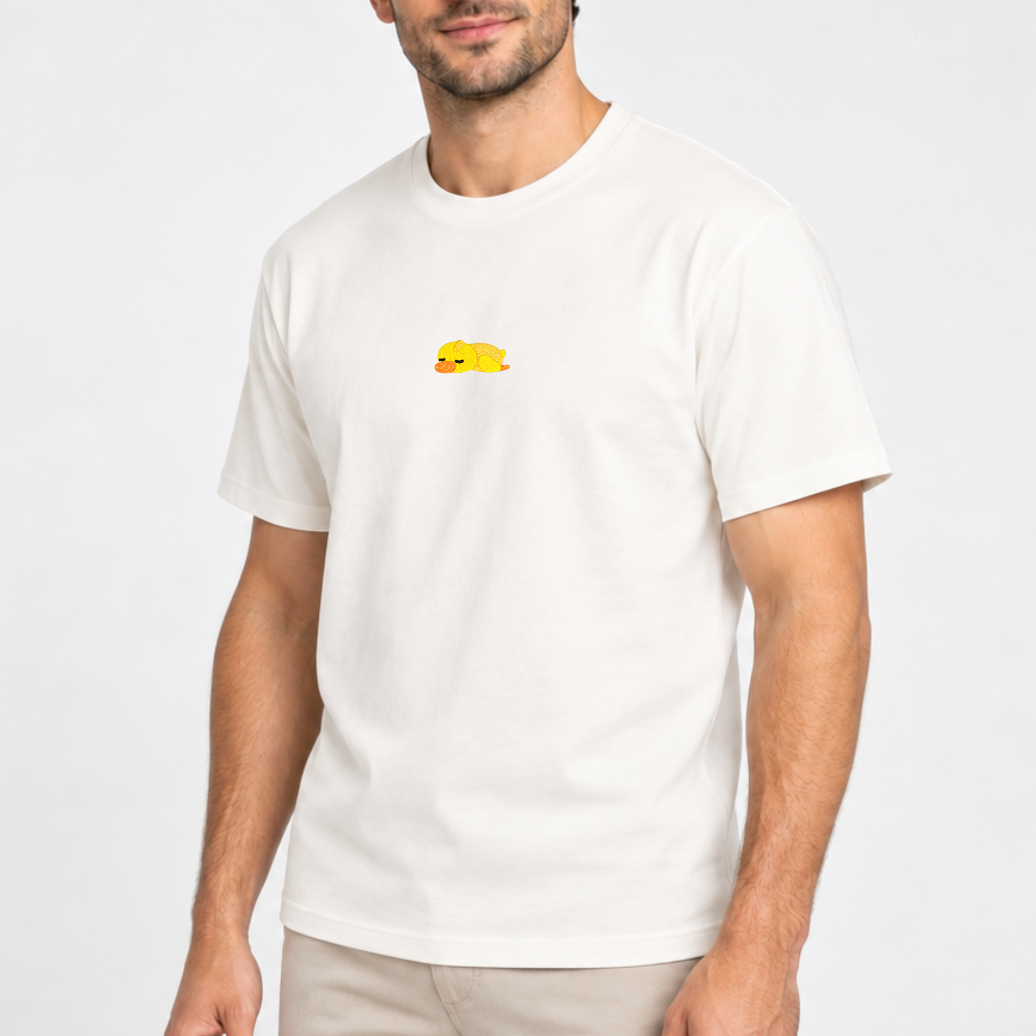 Men’s off white embroidered duck T-shirt with small yellow duck design on the chest