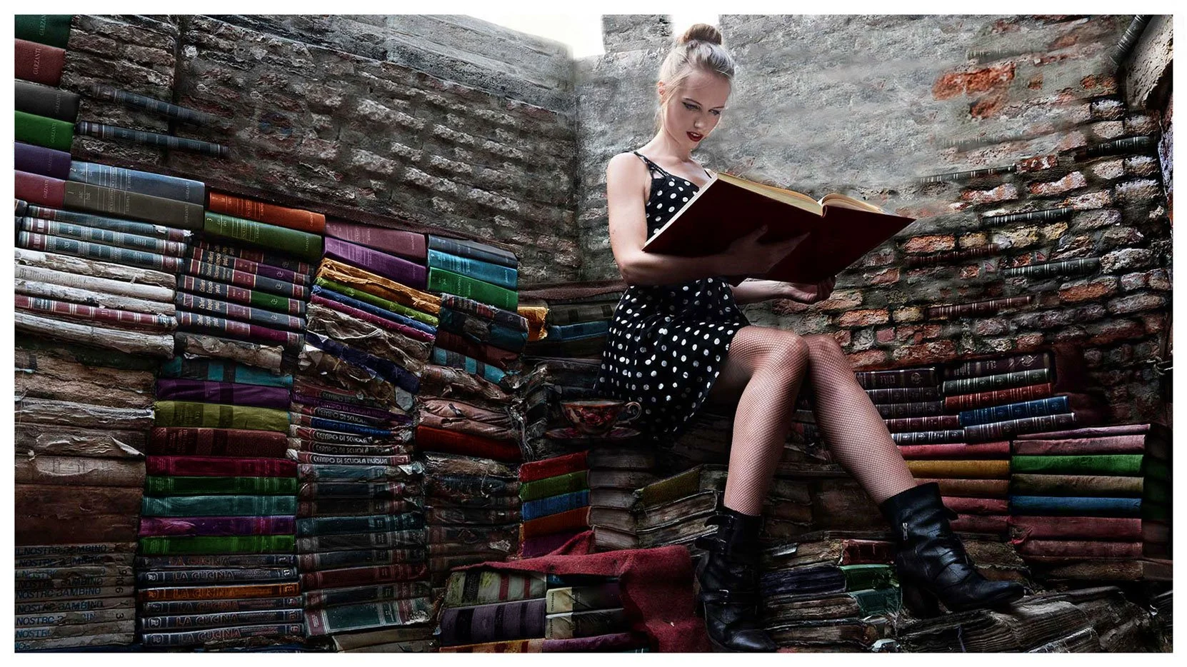 Suzanne reading books.