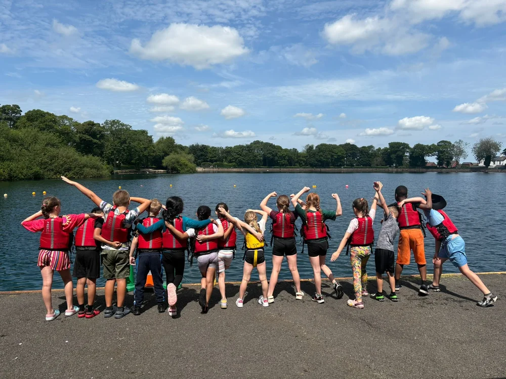 Young people taking part in a Vibe water activity