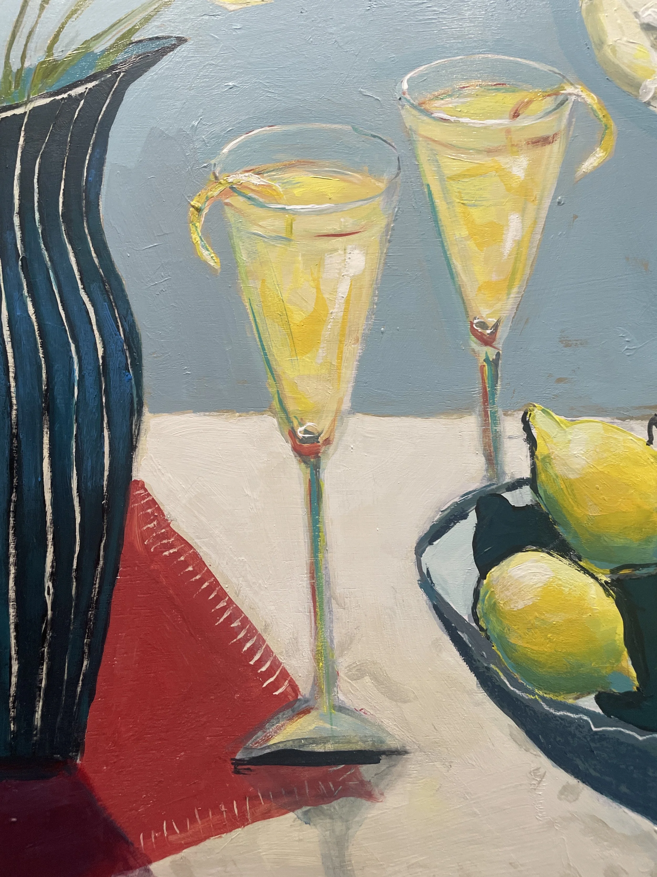 Close up of the cocktail glasses on this still life painting