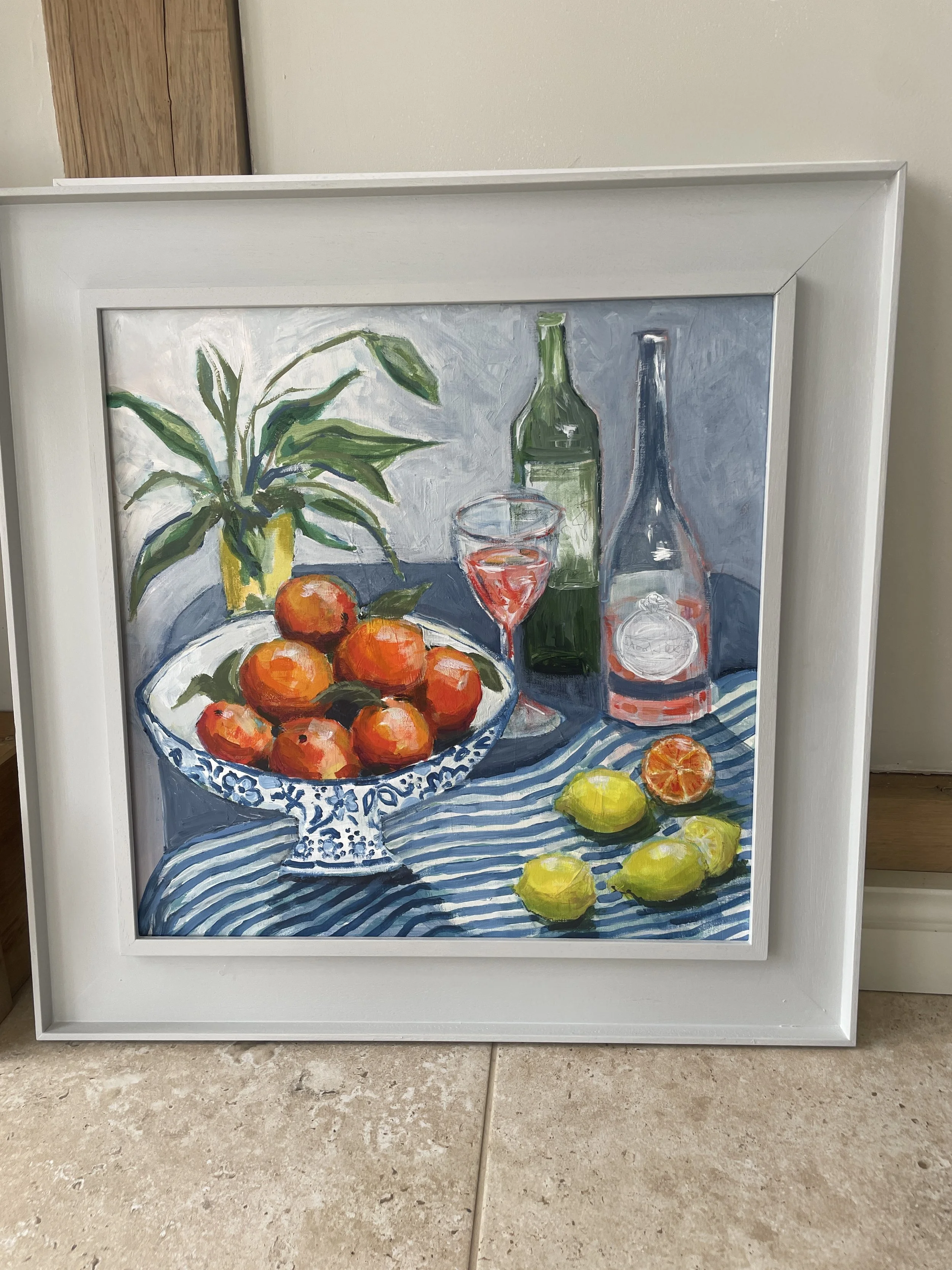 A still life painting by Shani Wray-Jenkins, set in a wide St Ives frame
