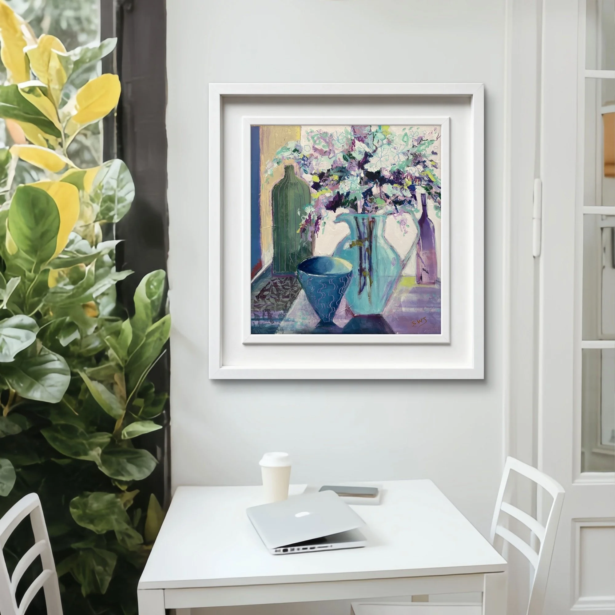 A still life painting by Shani Wray-Jenkins hanging on the wall of a dining room
