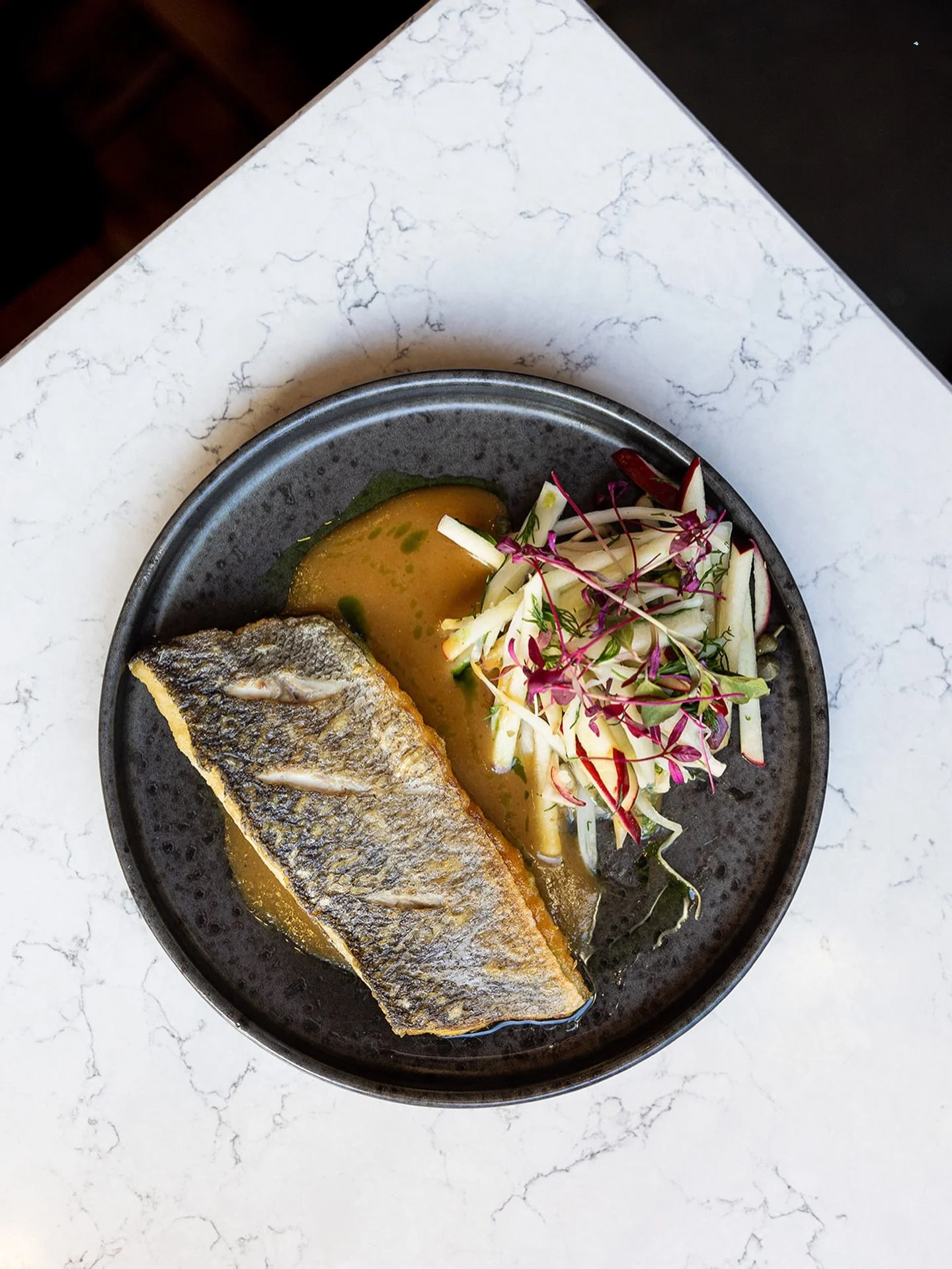 Grilled seabass with Thai curry sauce and apple fennel slaw 🐟

Absolutely delicious.

Make sure to book &mdash; we&rsquo;re back open tonight.