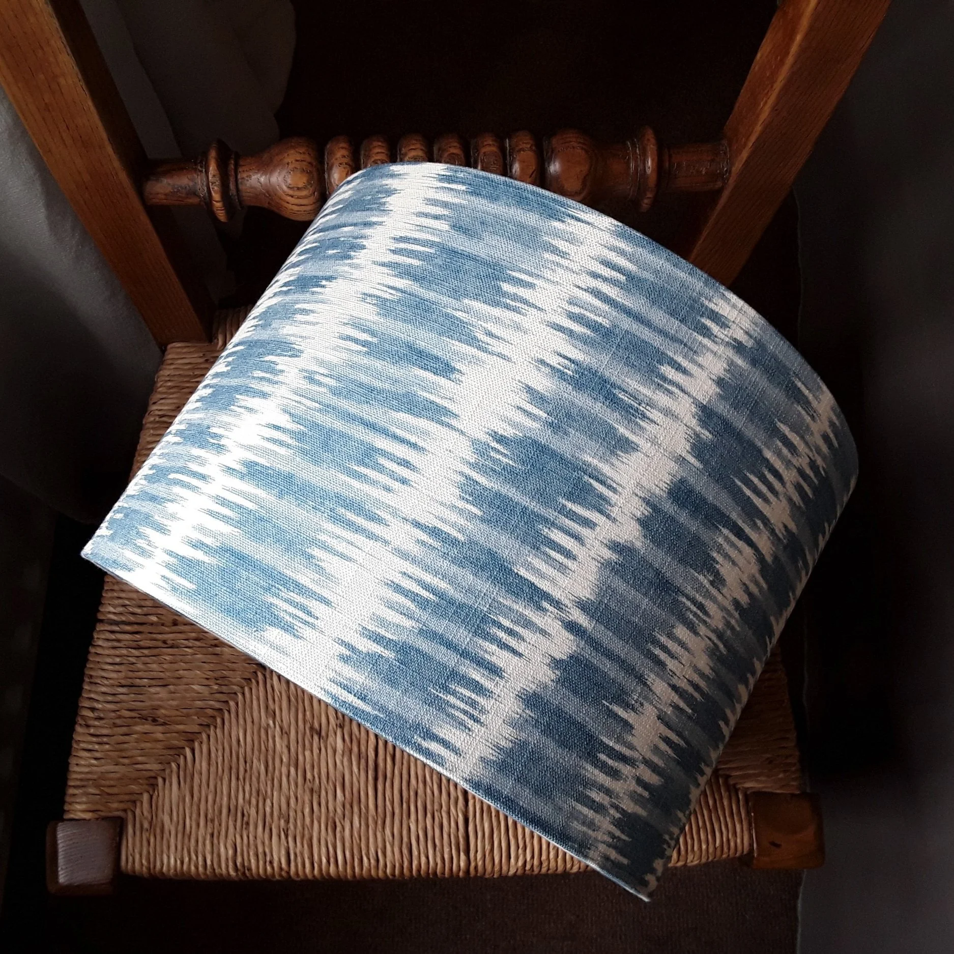 drum lampshade with aqua blue and white design, reminiscent of sunlight on water