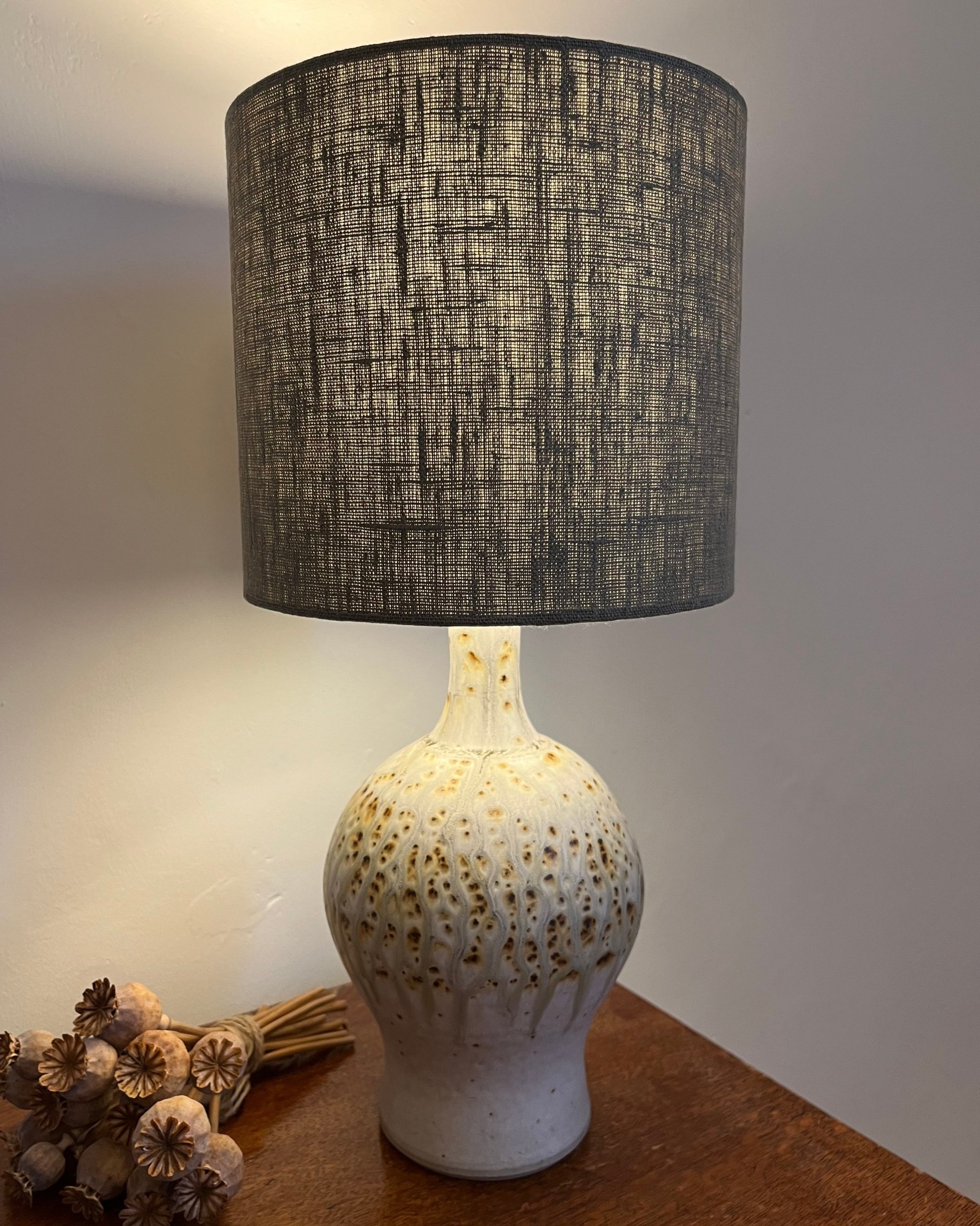 khaki green linen lampshade, illuminated