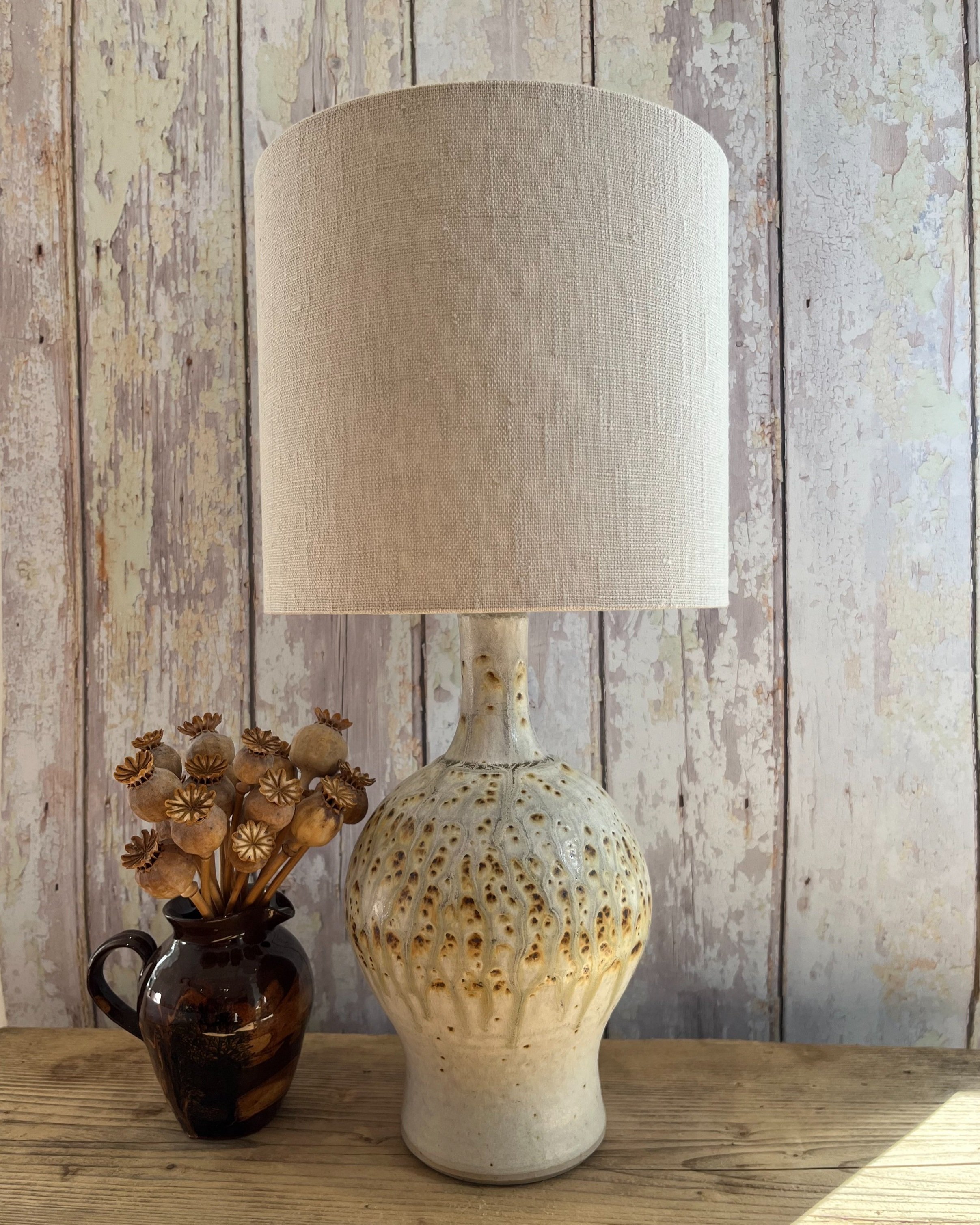 pale pearl grey linen lampshade on table lamp