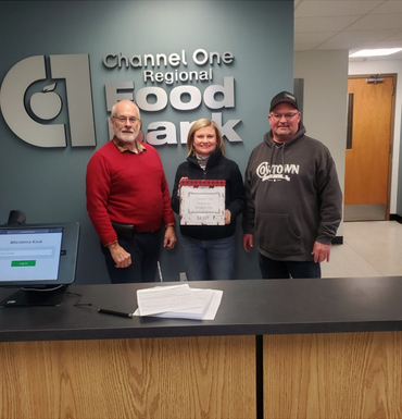 ER Stephen Rose and Gambling’s Ray Watson presented $4,176 to Channel One Executive Director, Virginia Witherspoon. Thanks to you members for donating $1,176 to which gambling added $1000 and an ENF Grant provided another $2000. Thanks to your member