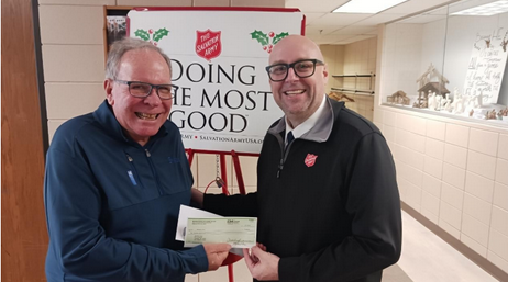 Charlie Brannon presented a $2000 check to the Salvation Army
Captain Michael Hinton. This donation was the result of an ENF Grant.