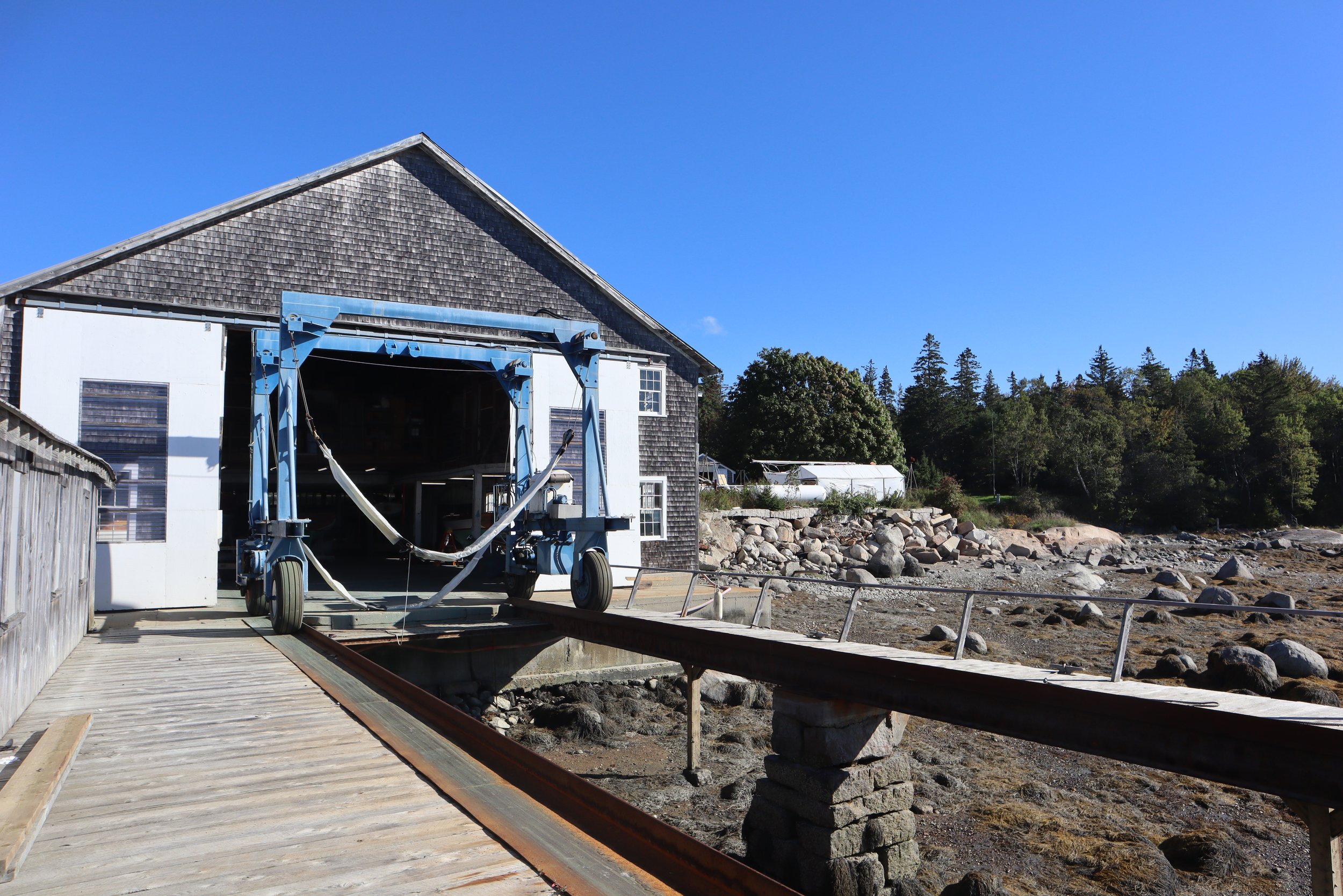  The small travelift outside the cannery building on a sunny day.  