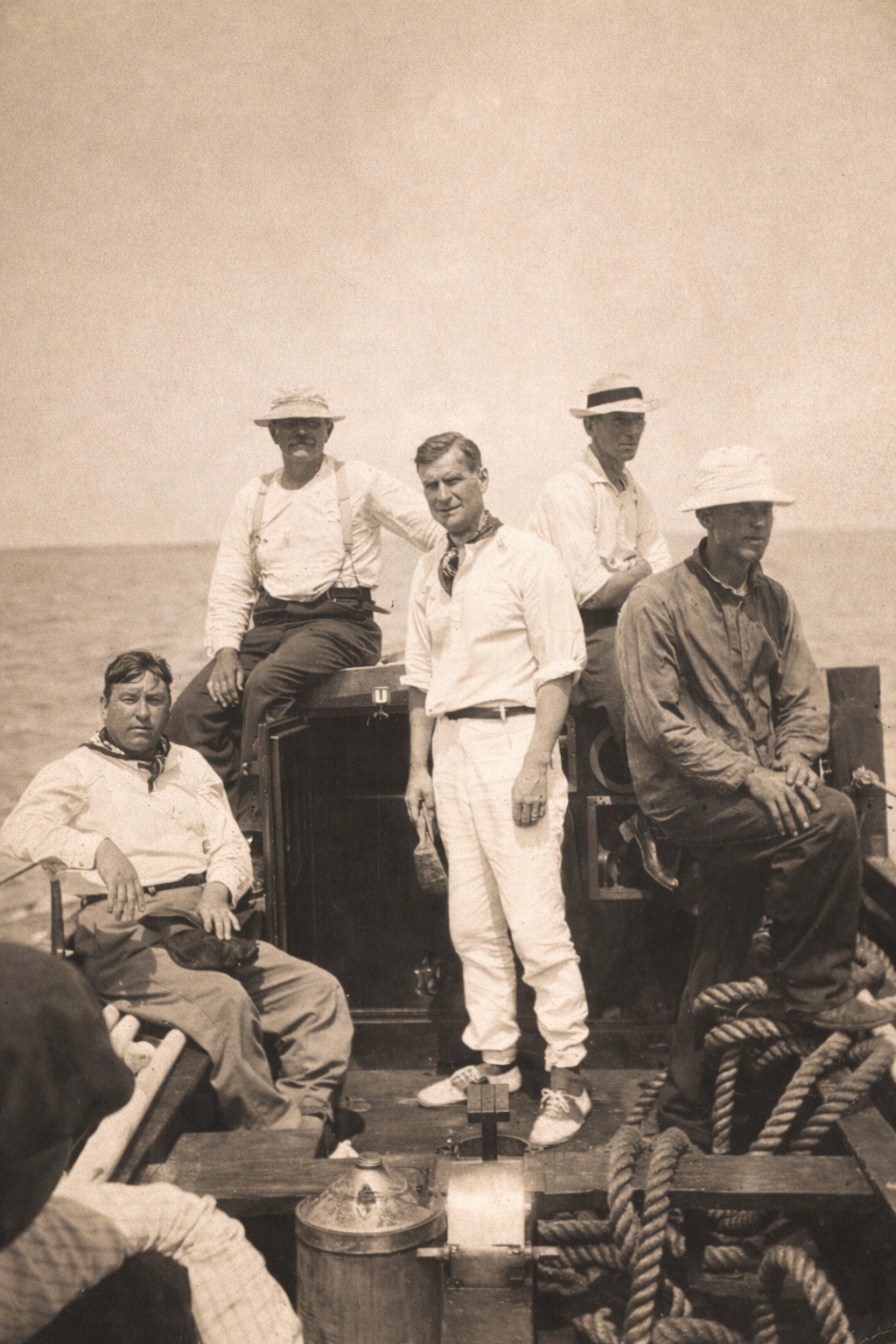 2003.07.017.4b Men on lifeboat (original in archival storage).png