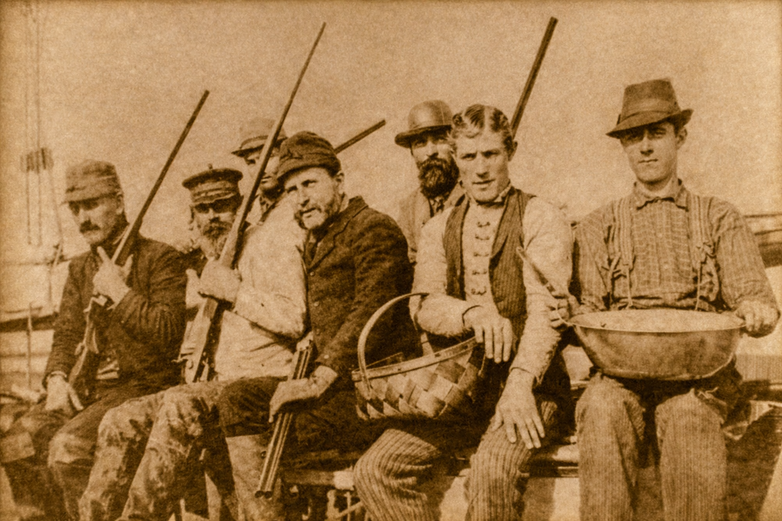 Elkanah Cobb 2nd from left holding shotgun c 1892