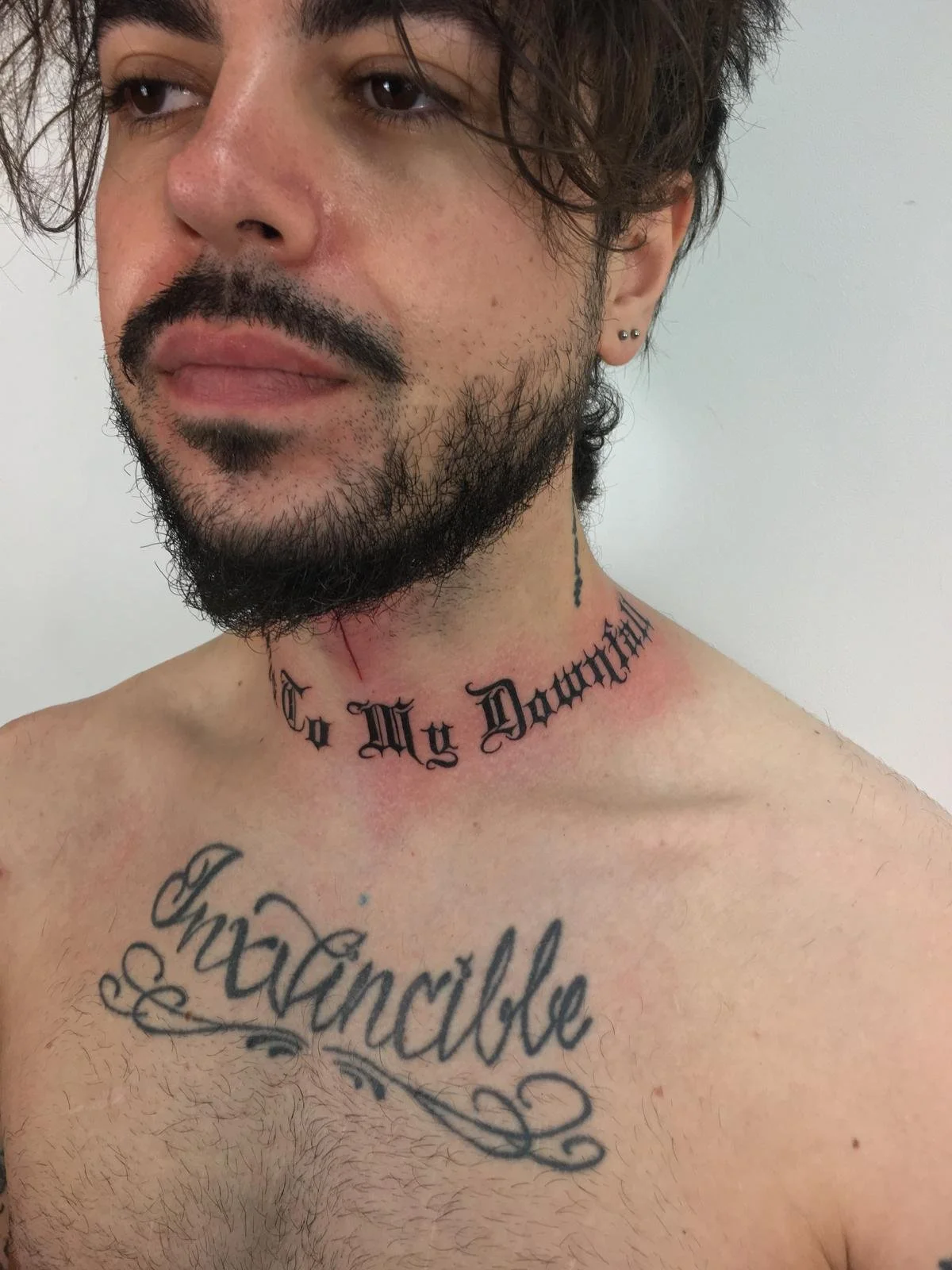 Neck and throat tattoo .jpg