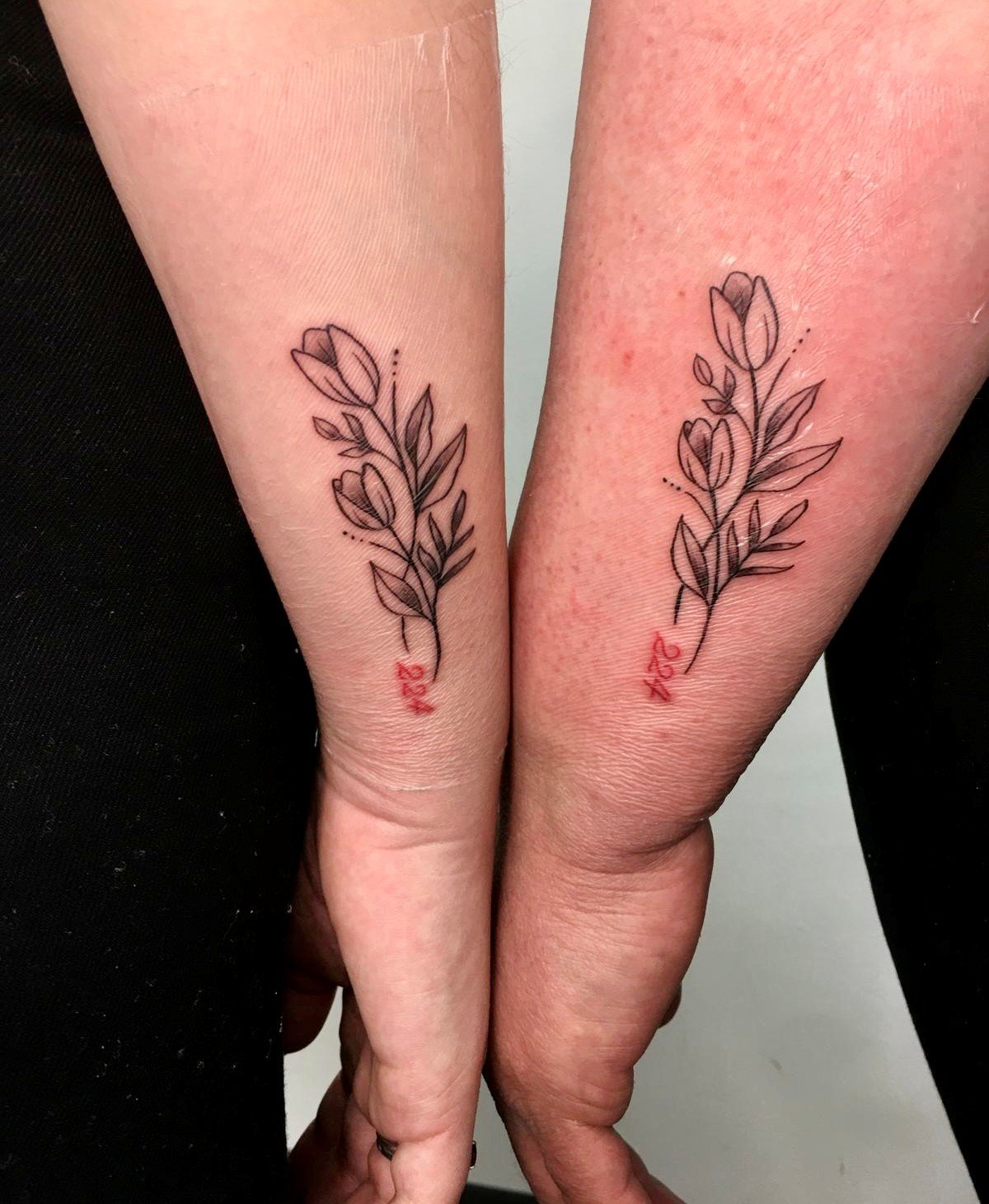 Mum and daughter matching tattoos.jpg