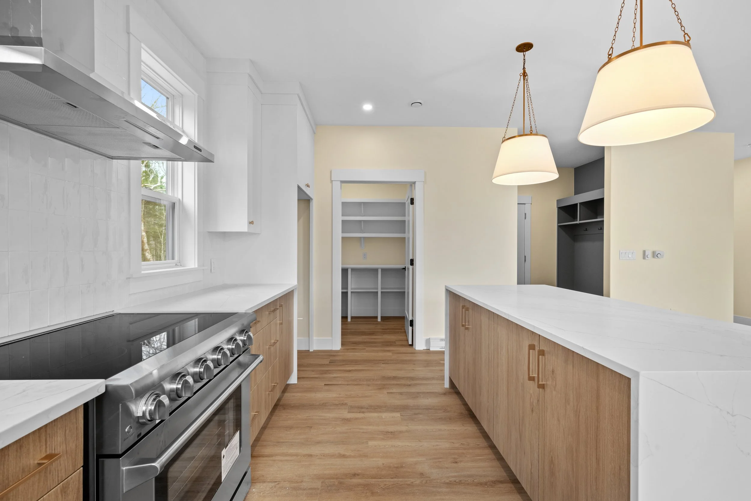 Large pantry and laundry room adjacent to kitchen