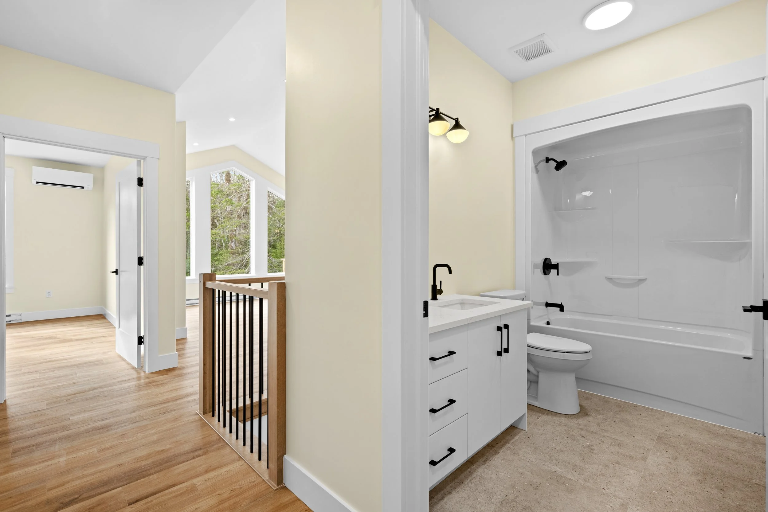 Main bathroom conveniently located between bedrooms and main living areas