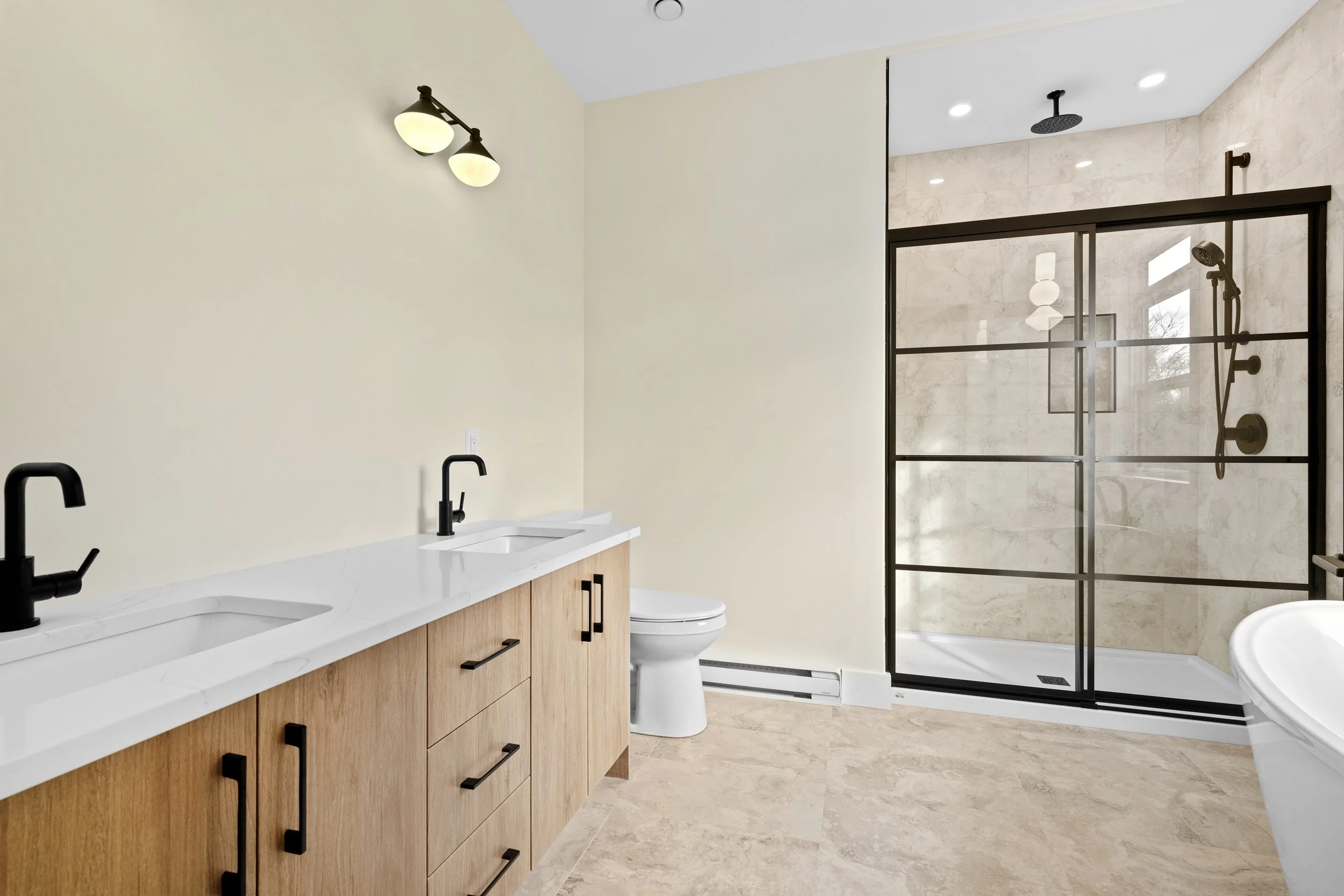 Double vanity completing the 5-piece ensuite