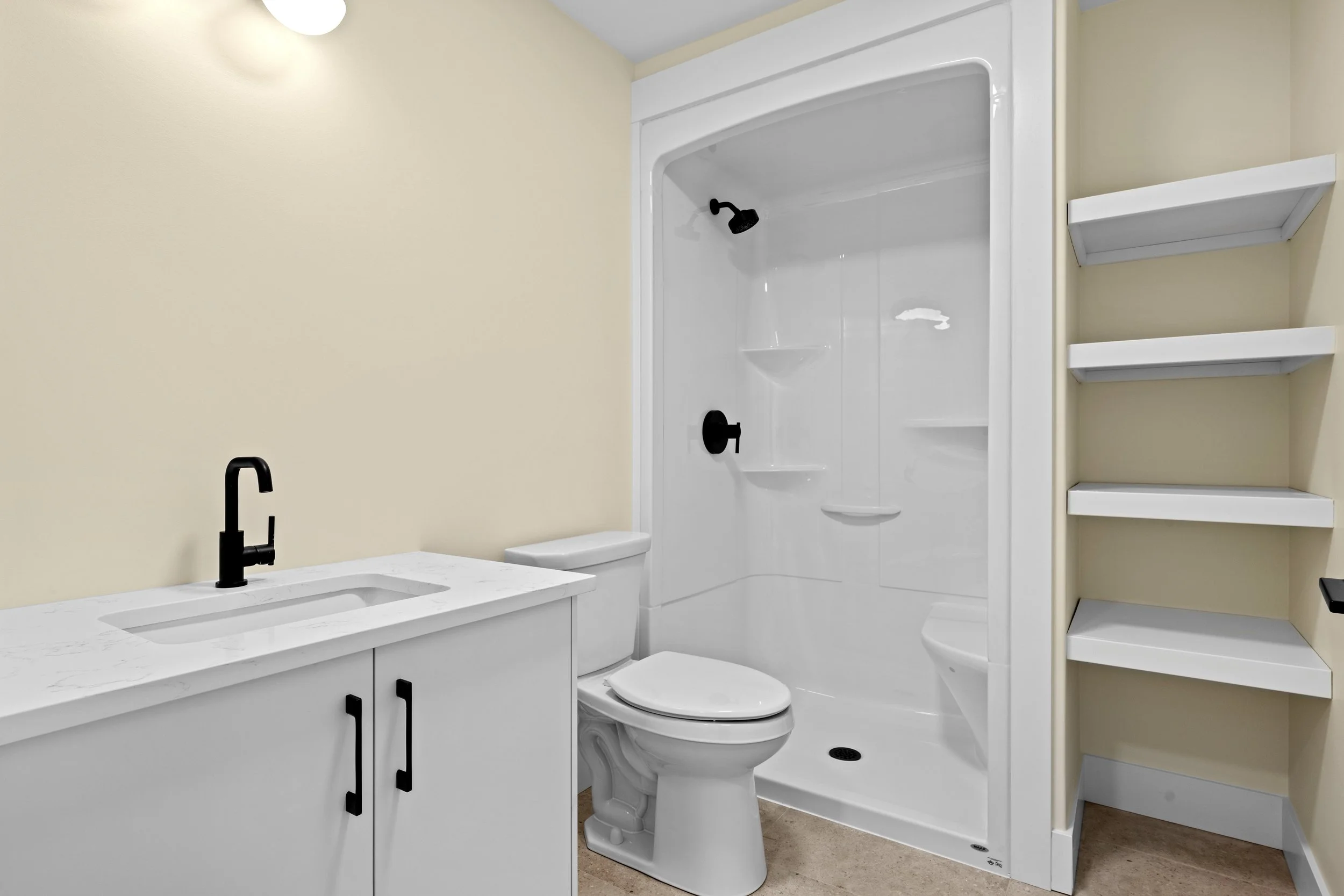 Basement bath with plenty of storage