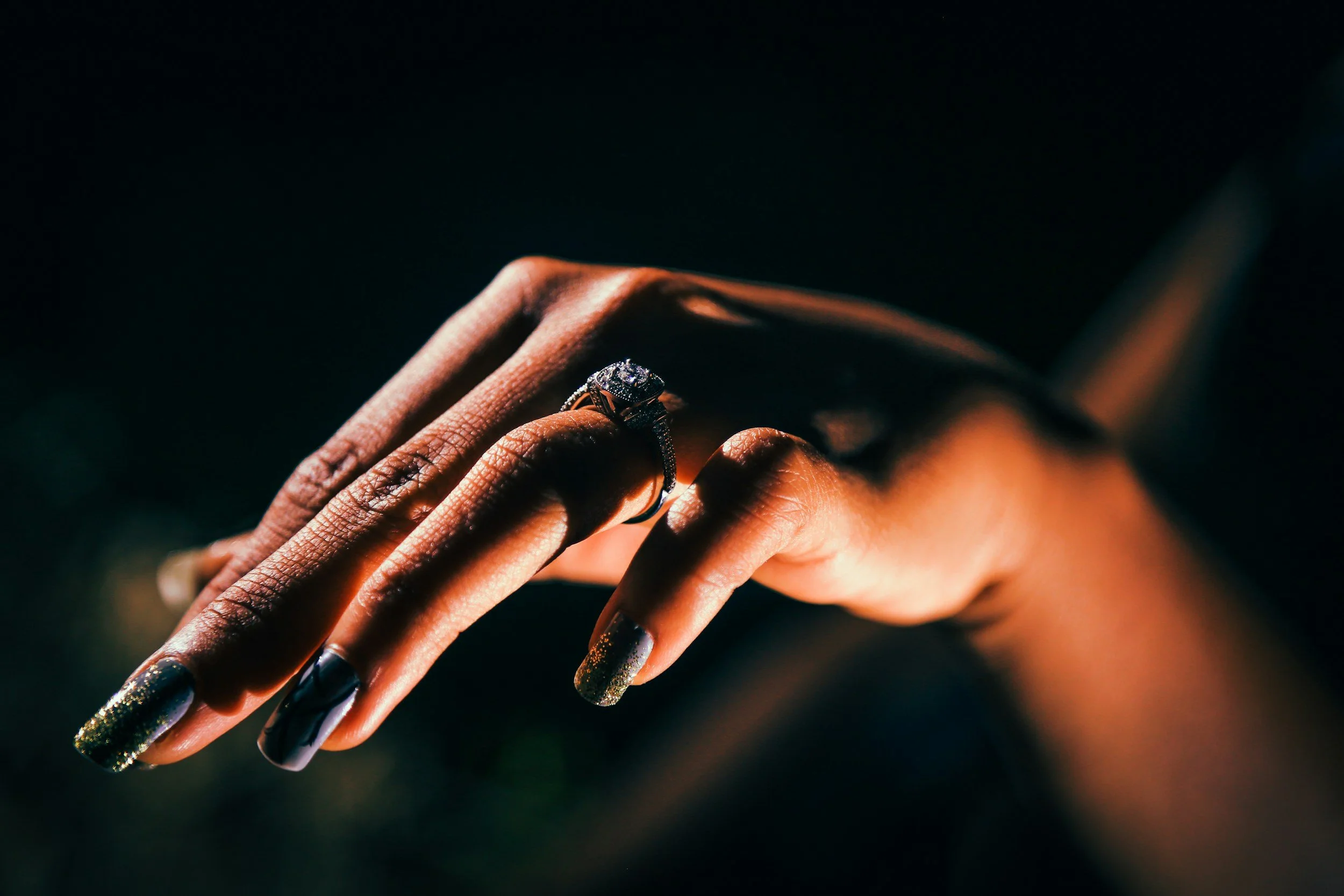 African American hand with nail art