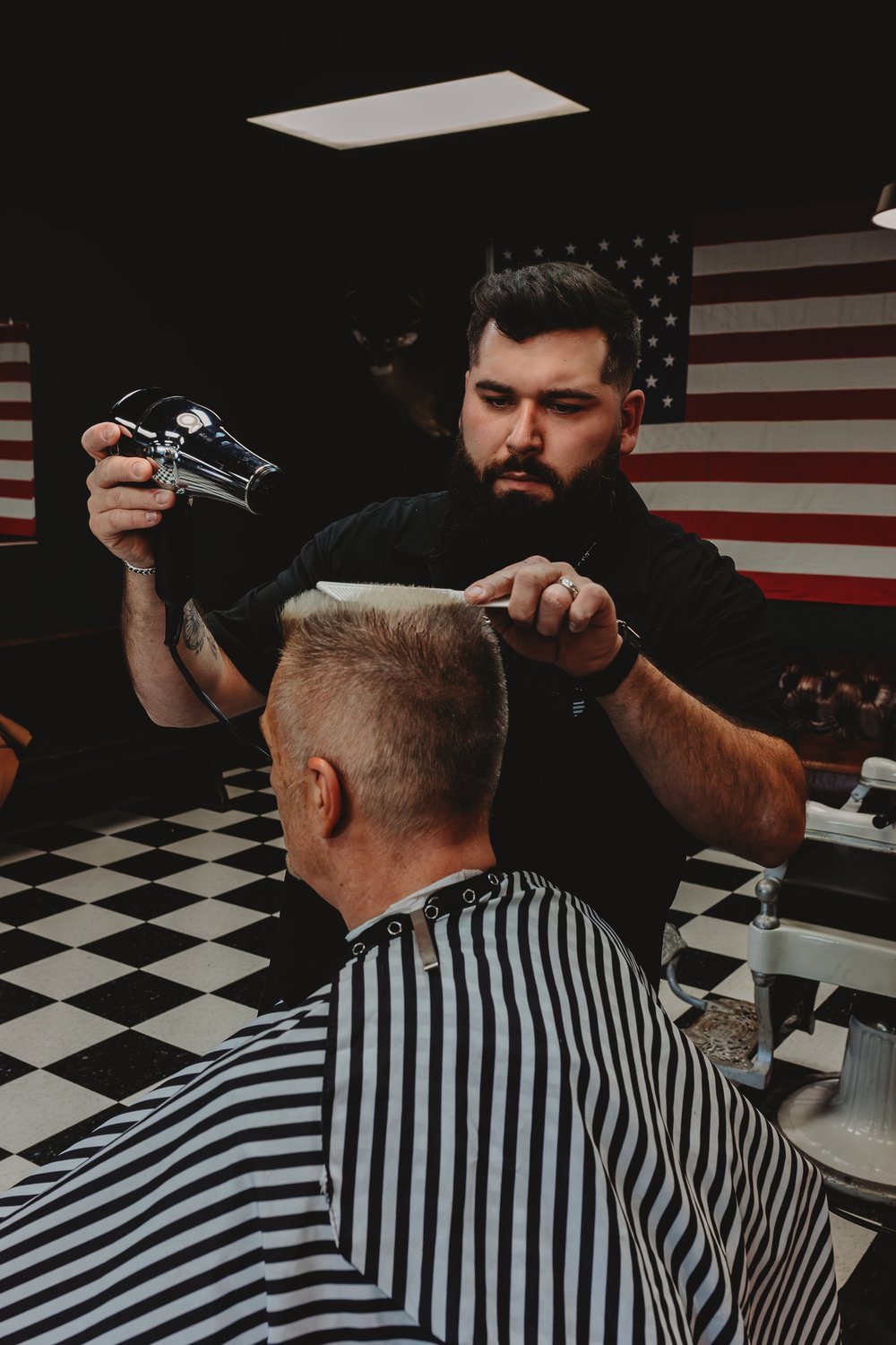 Barber at work — Three Hounds Barbershop Hendersonville NC