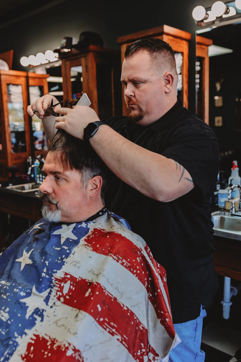 Clean taper haircut Three Hounds Barbershop