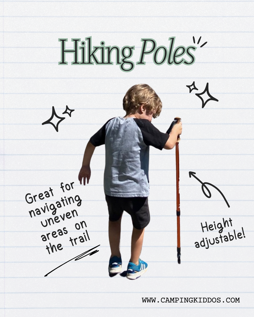 little boy hiking while holding a hiking pole in his right hand