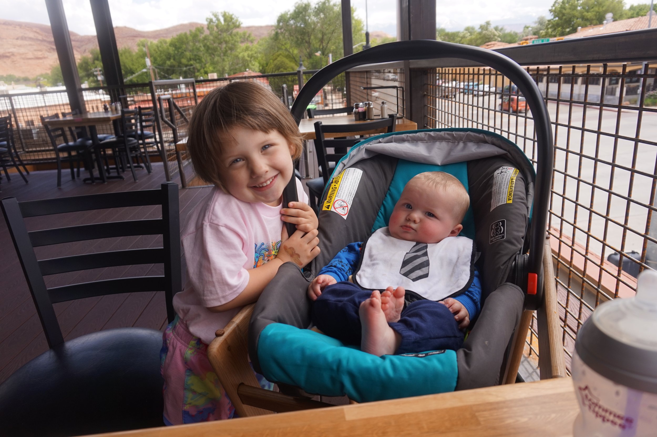 The author's young children at the upper deck of Zax restaurant in Moab