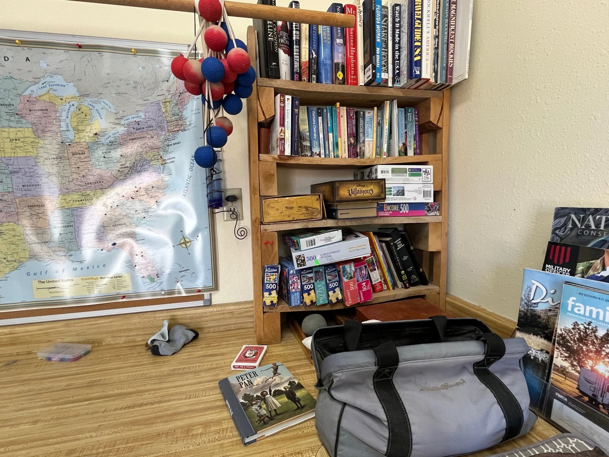 Books, puzzles, and games in the campground's free lending library