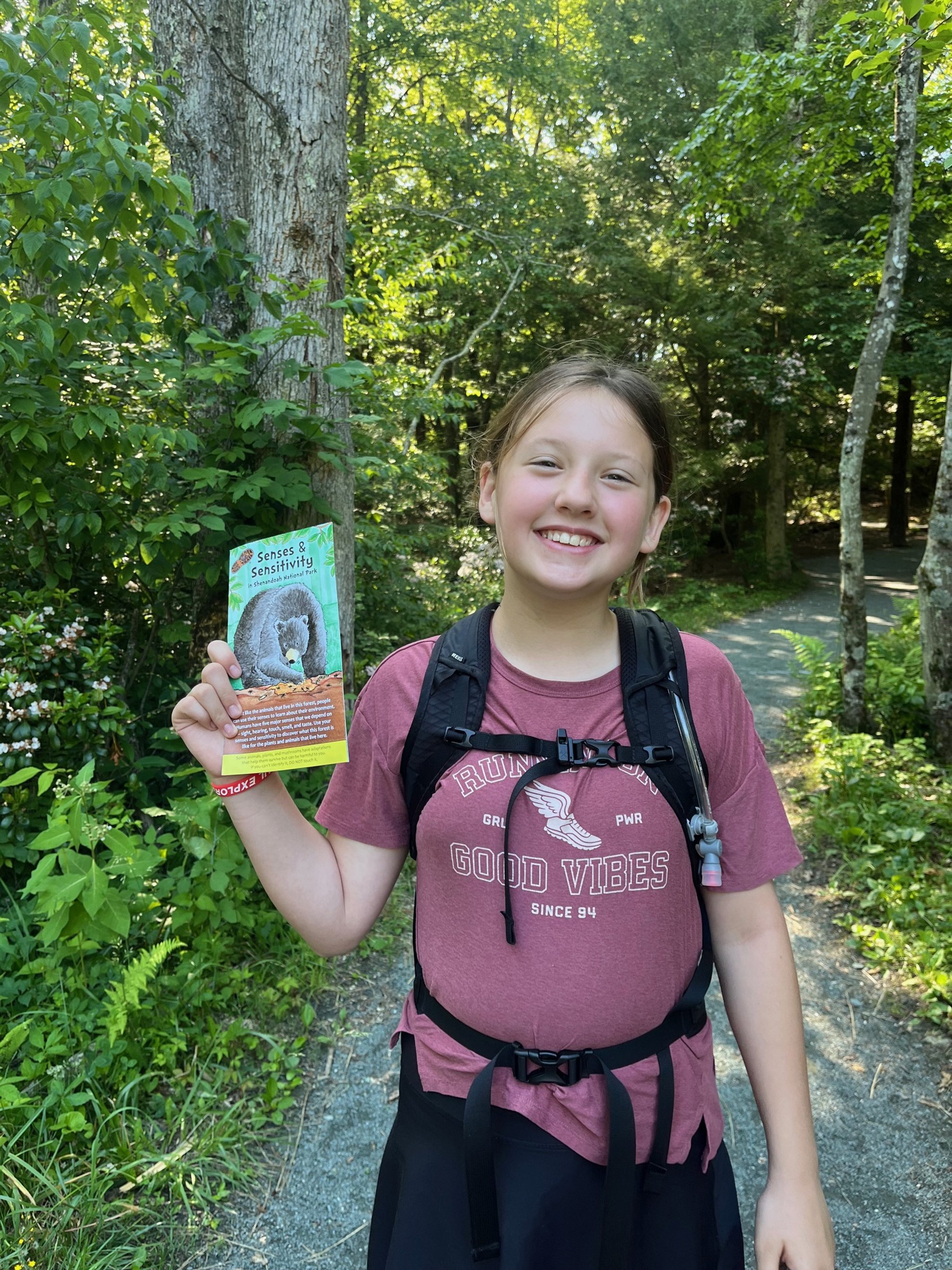 My daughter with her pamphlet