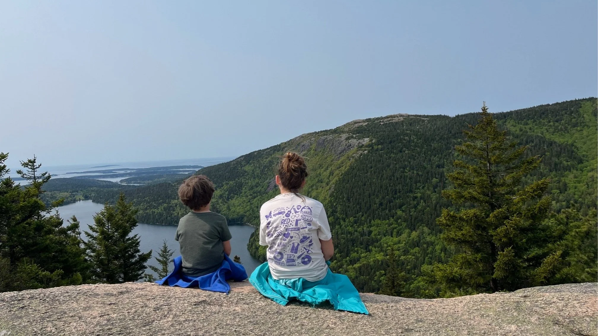 The author's children in Acadia National Park overlooking Jordan Pond