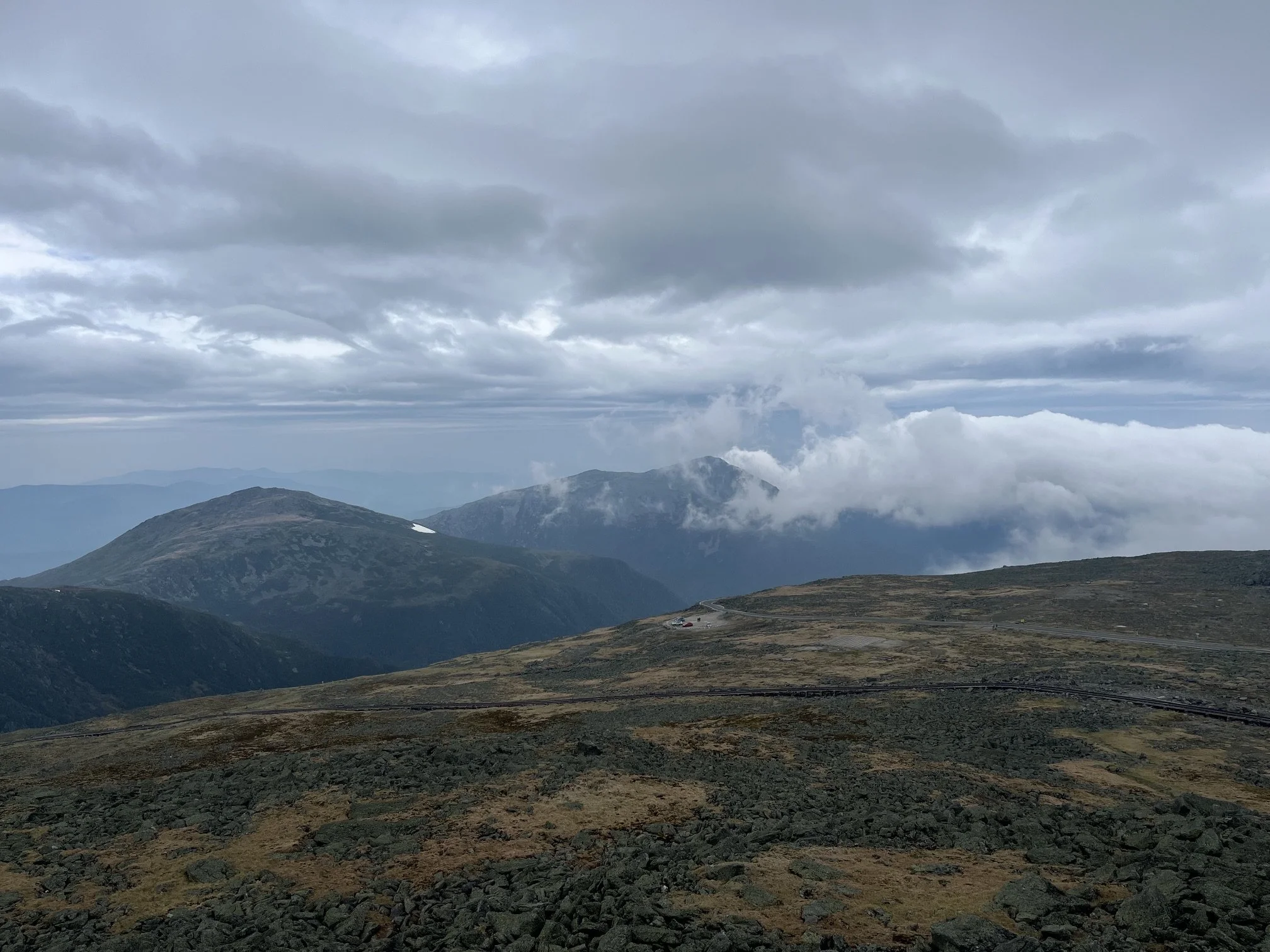 The fog rolls past the summit of Mt. Washington