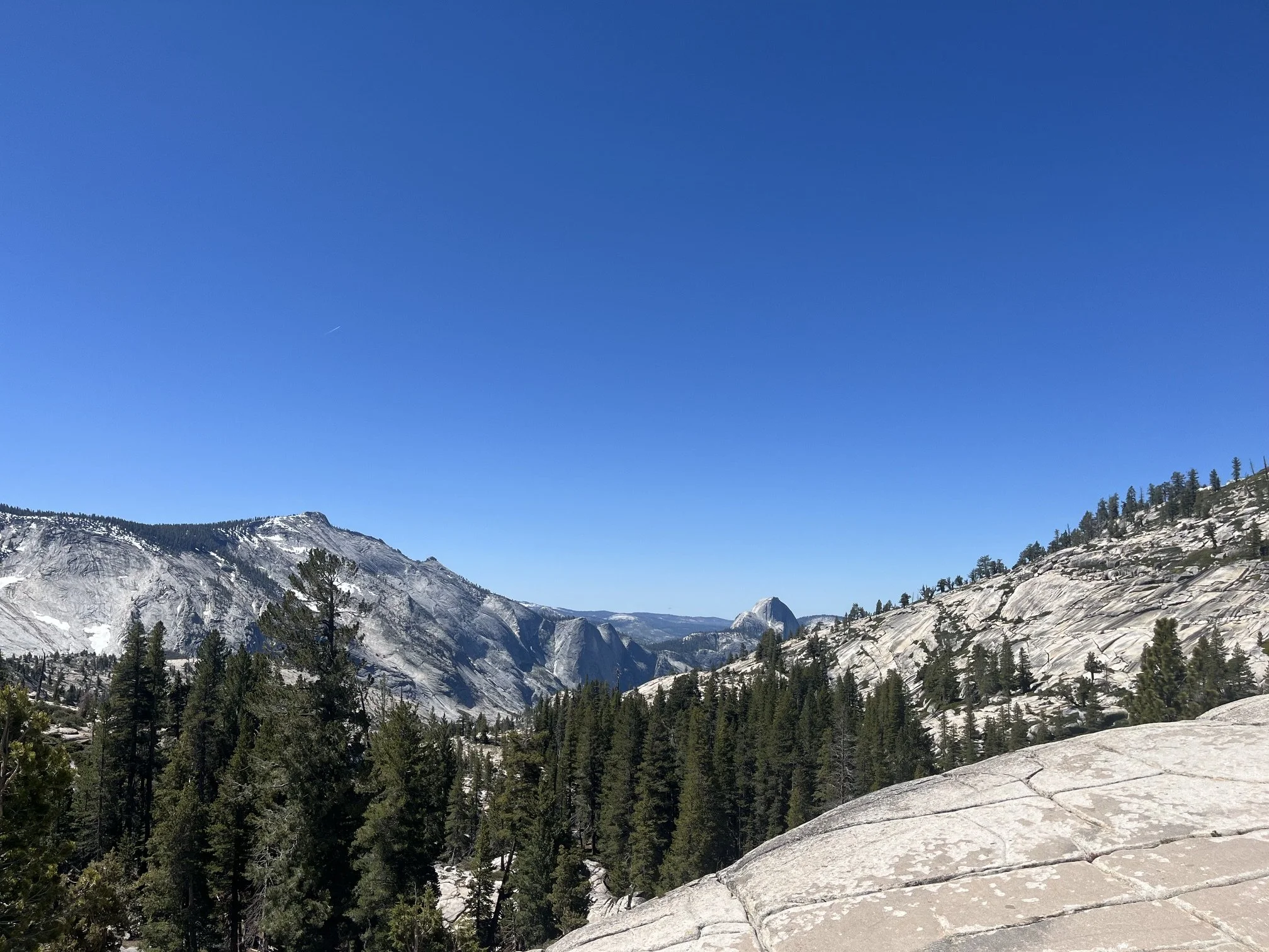 Long range views of the Sierra Nevadas and Half Dome from Olmstead Point