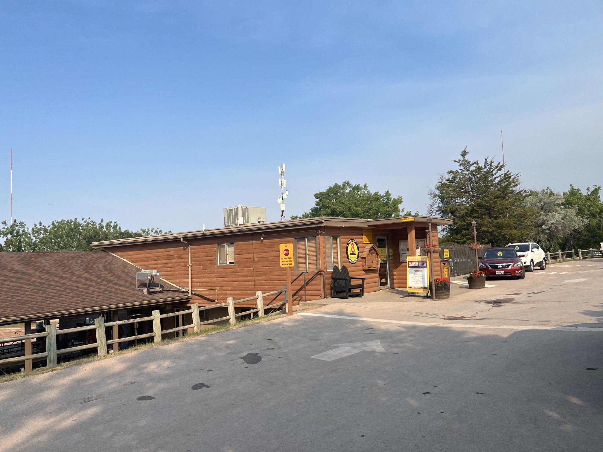 The wooden building for the main check-in desk and camp store at Rapid City KOA