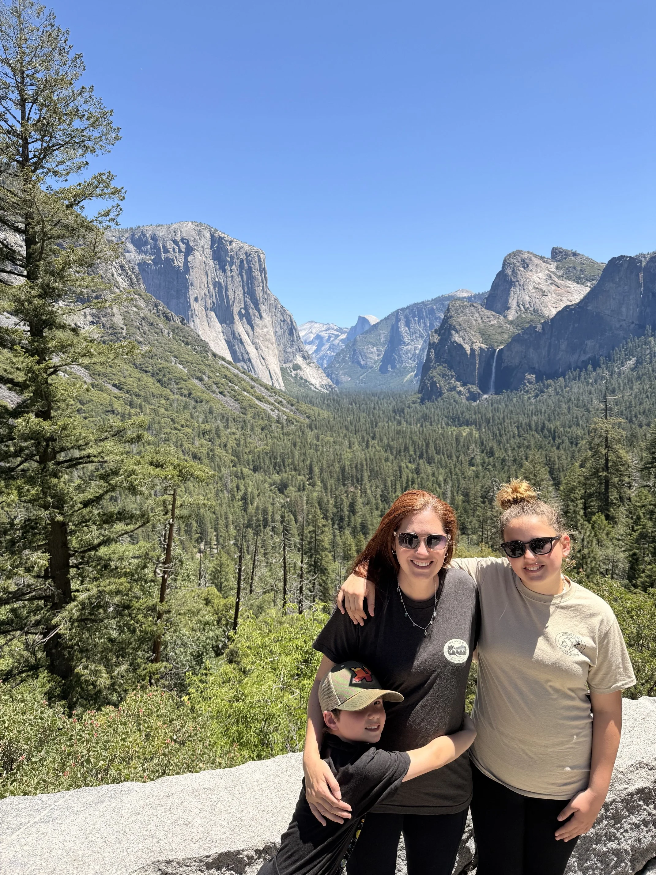The author and her kids at the Tunnel View overlook