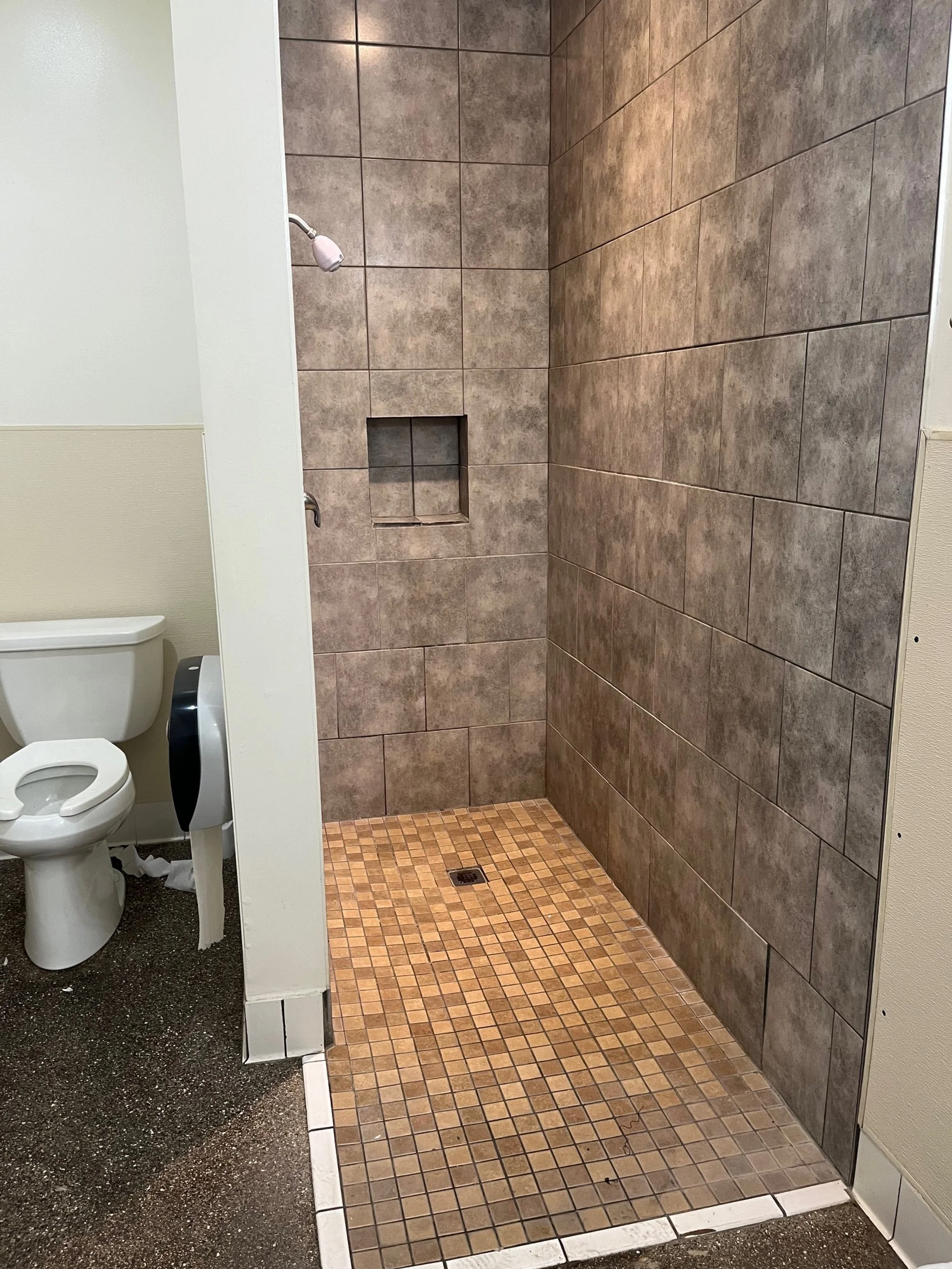 Tiled interior of the shower area in the bath houses