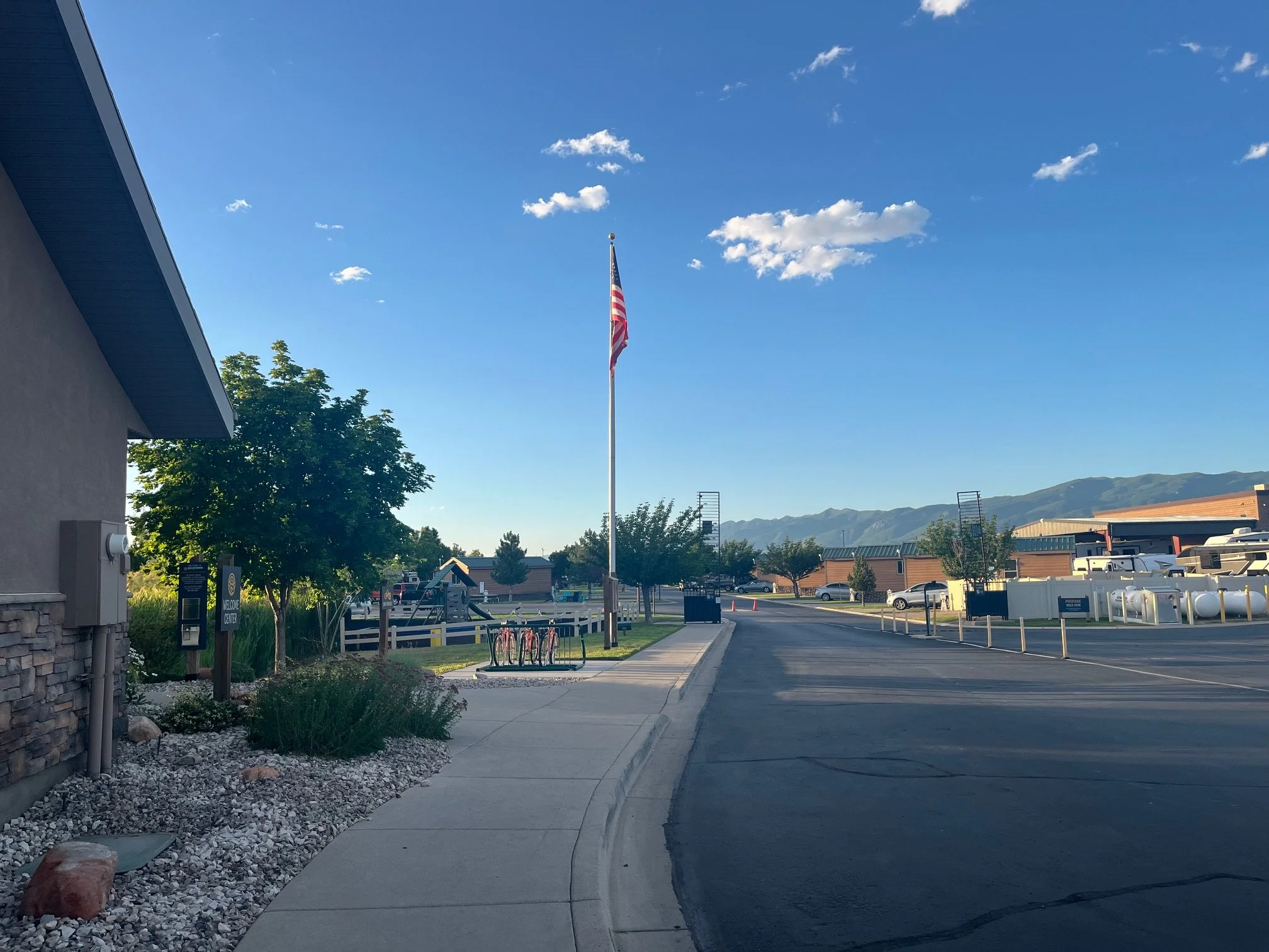 The entrance road into the campground with the Wasatch Mountains in the background