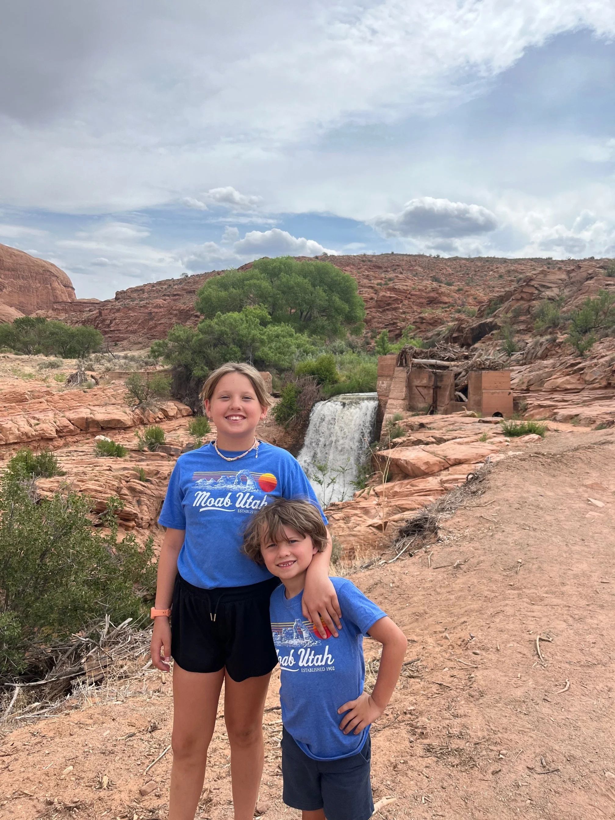The author's children stand in front of the first waterfall in Mill Creek Recreation Area