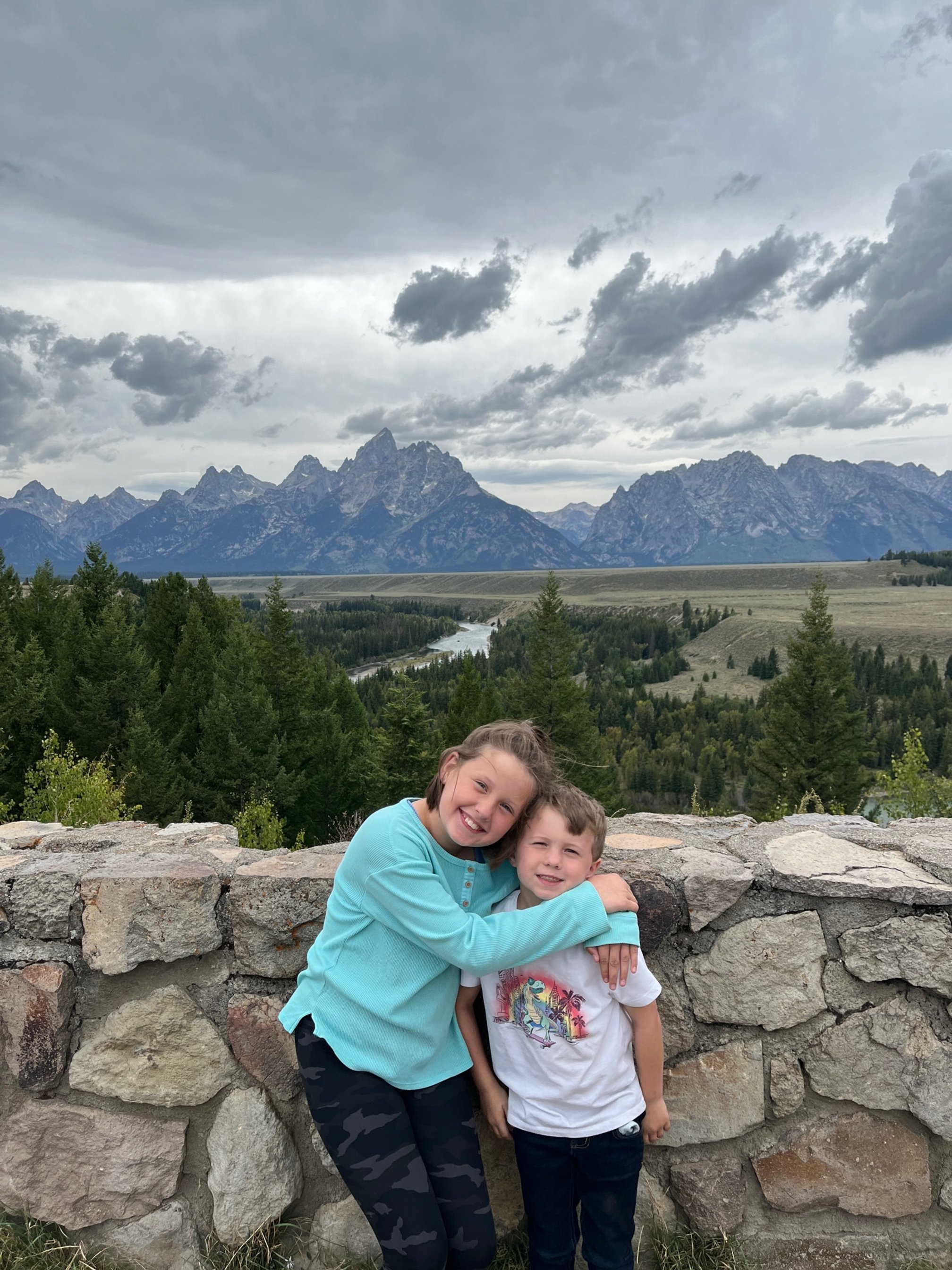 The Camping Kiddos stand in the same place as Ansel Adams did to get his famed photo of the Tetons and Snake River