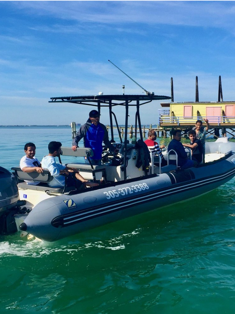 Group of people on a small boat at Stiltsville in Biscayne Bay