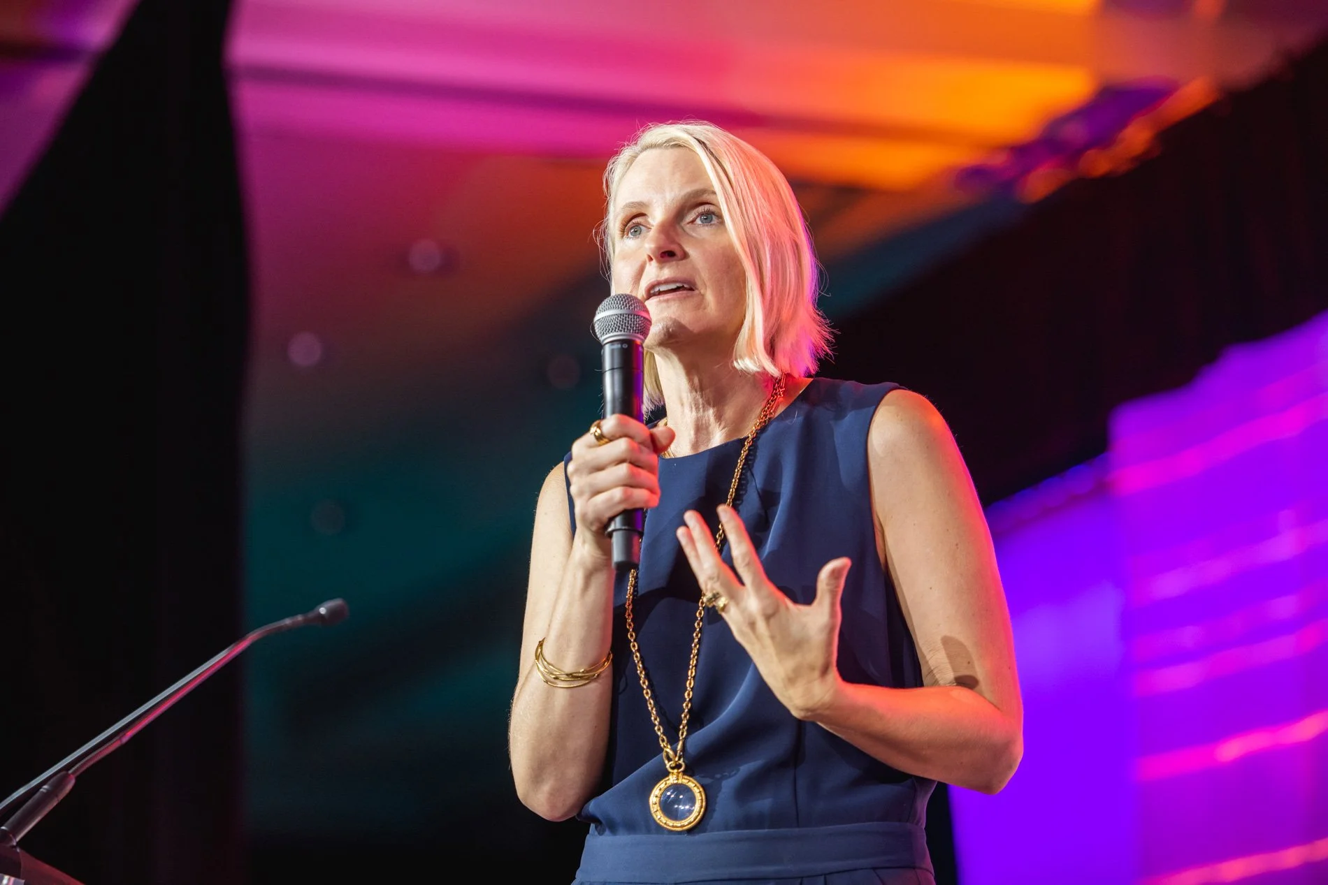 female keynote speaker captured by tico mendoza corporate event photographer  in Austin Tx