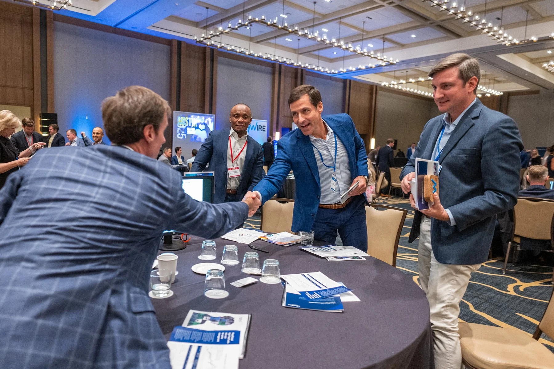 Attendees networking during the Citywire conference reception."