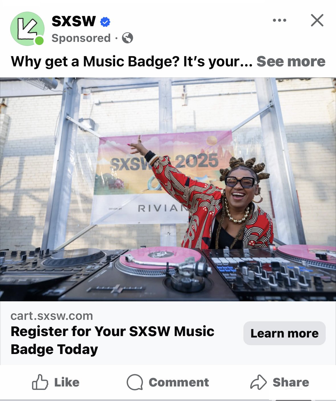 A woman with styled hair, wearing sunglasses, a patterned jacket, and jewelry, is DJing at SXSW 2025 event. She is smiling and pointing upwards behind a DJ setup in an outdoor industrial area.
