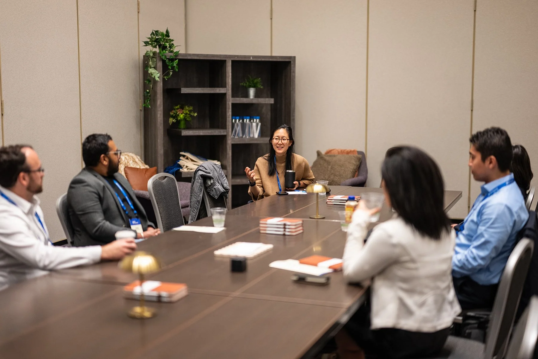 Professionals participating in a workshop session during the AI Council conference.