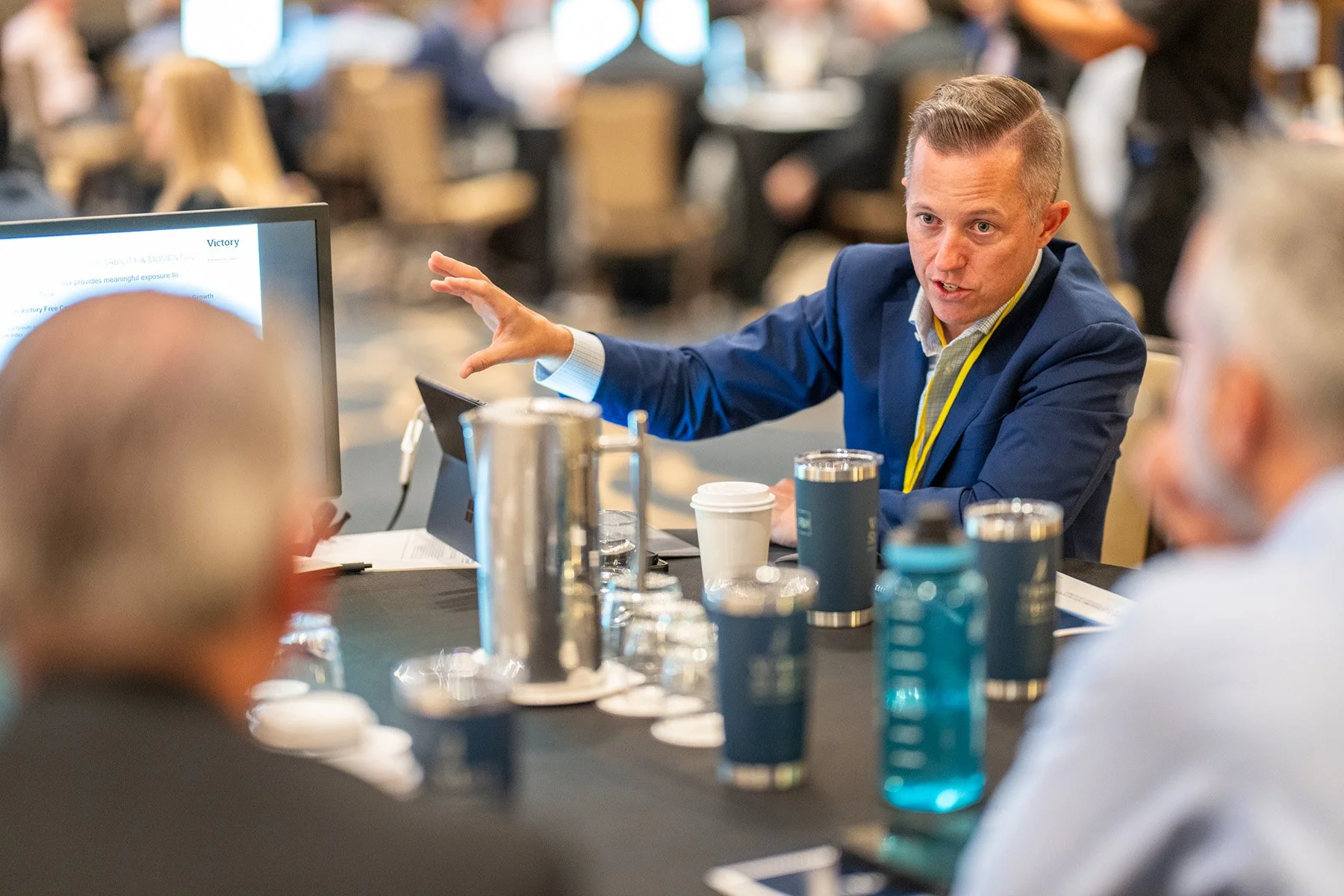 Conference attendees engaging conversation at Citywire event in Austin, Texas