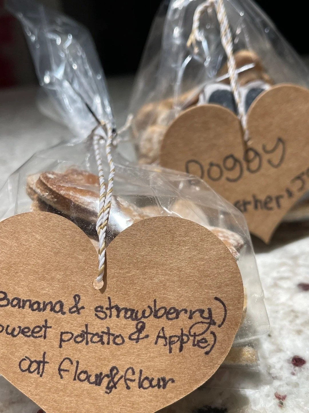 Homemade dog treats containing yams, apples, strawberries, and bananas