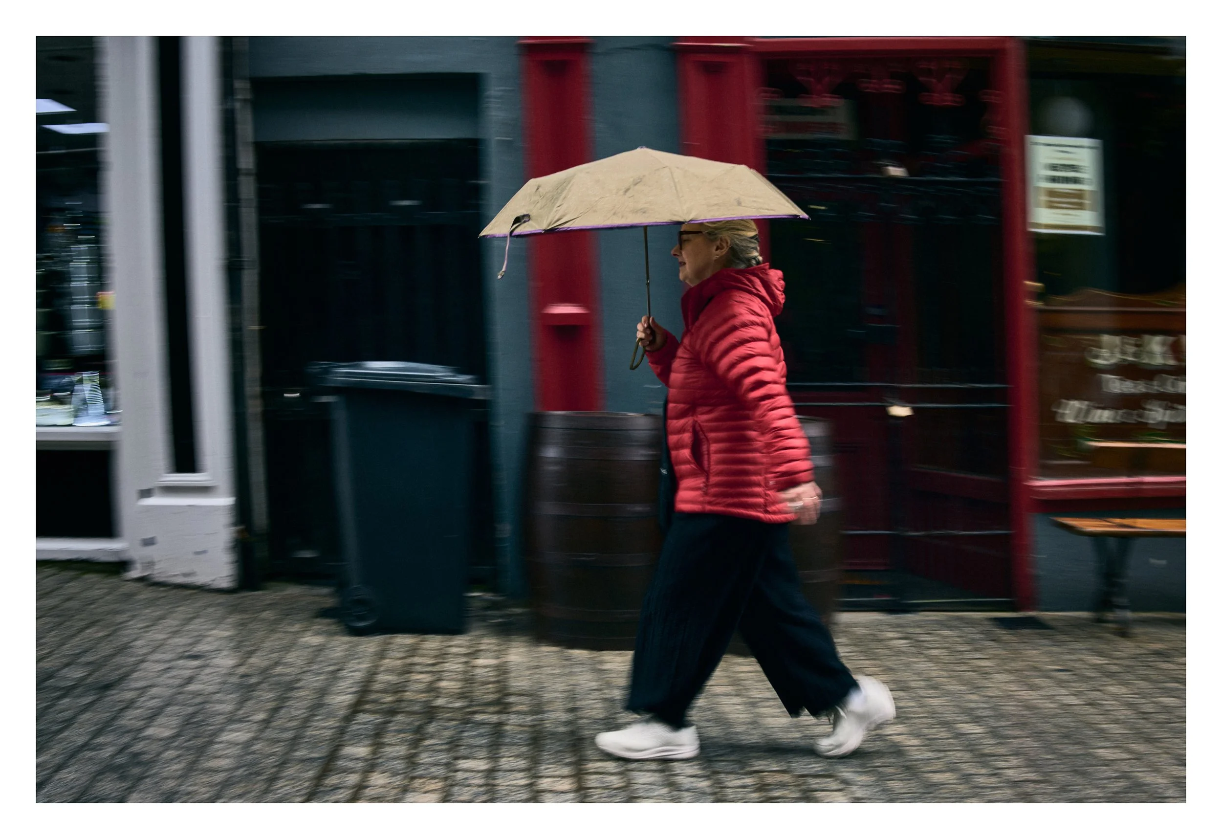 Lady In Red Coat, Waterford, Ireland 2025 photographed by Dave Haworth