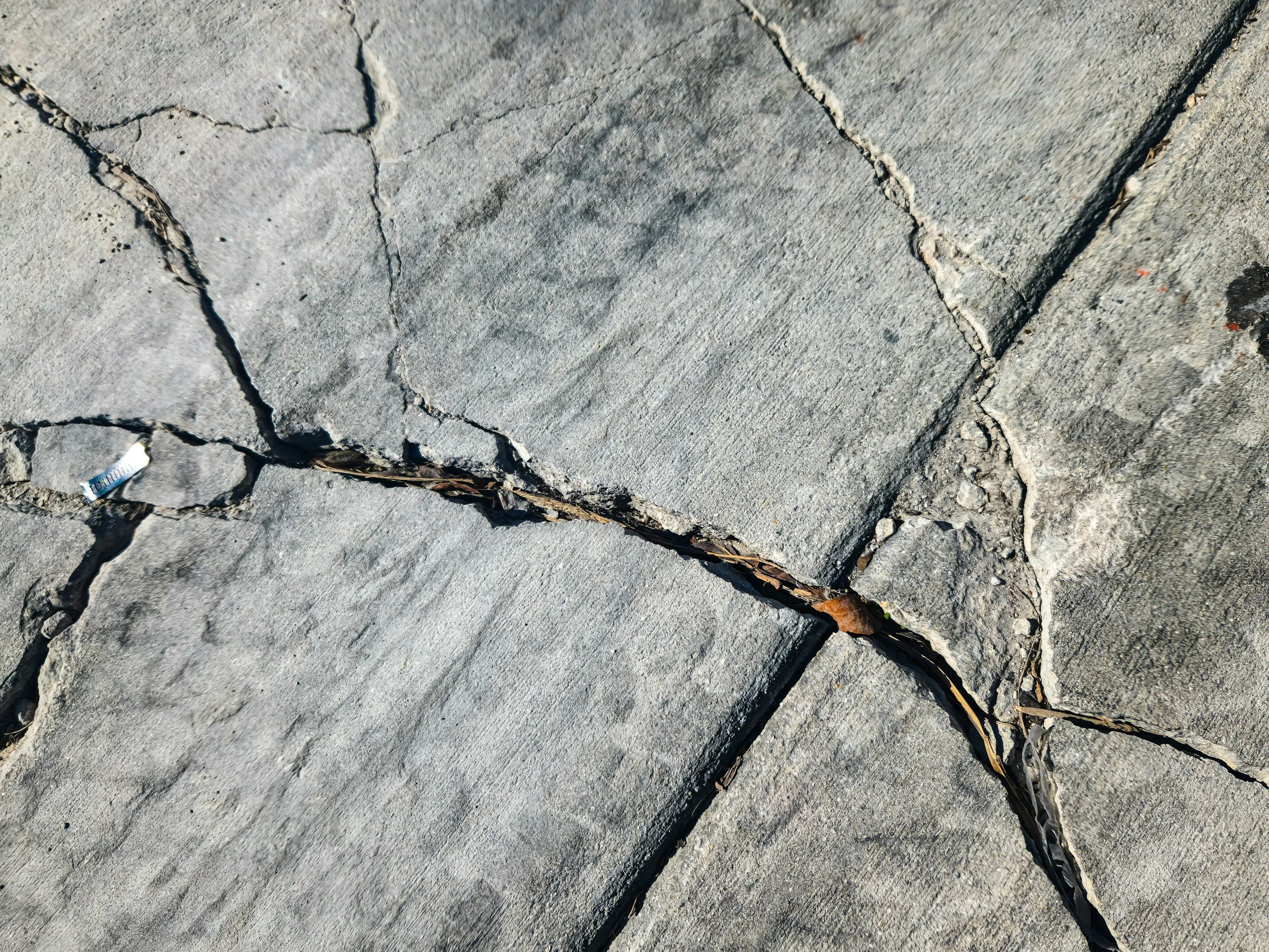 cracked pavers in need of repair